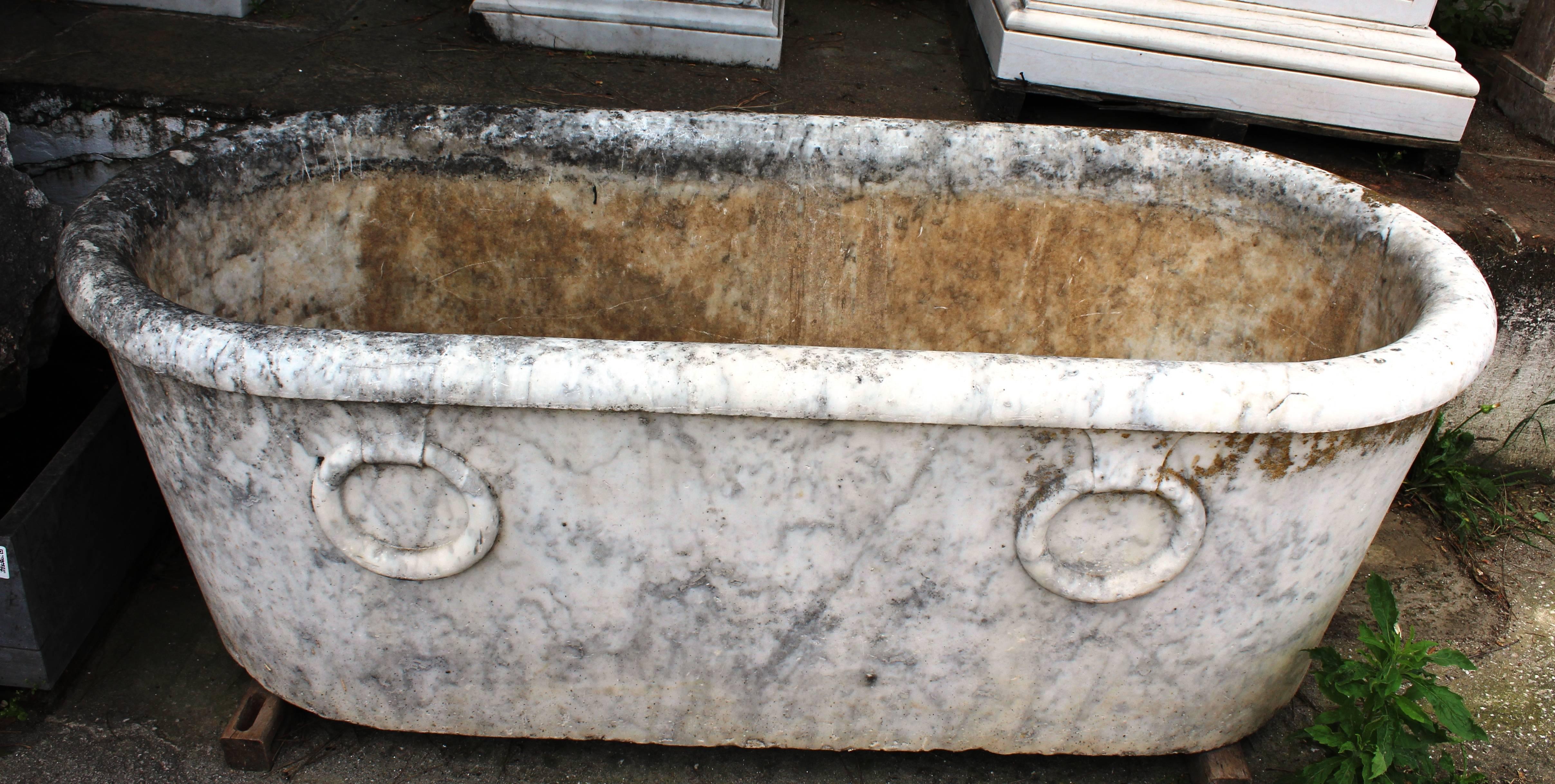 White Carrara marble bath with rings in relief. Architectural antique from a period spa in northern Spain.