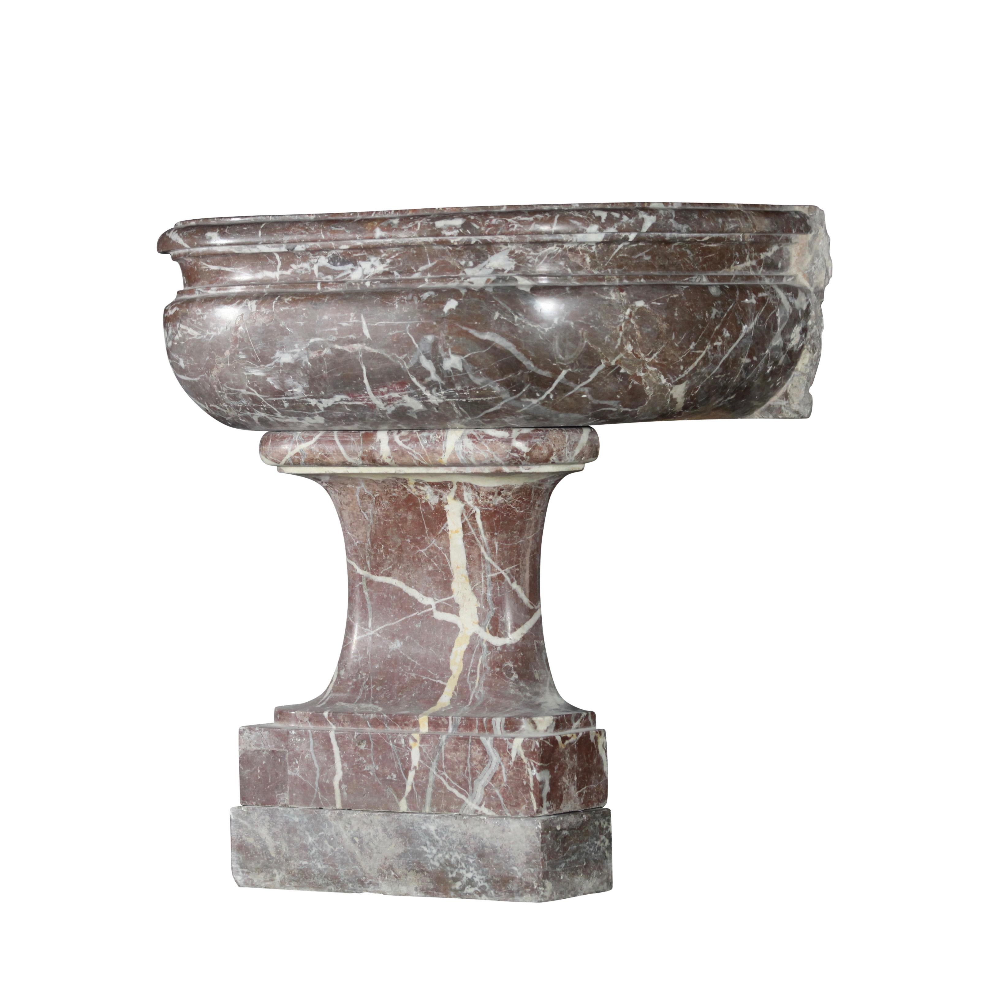 Original antique wine cooler from the Louis XIV period in Rouge Royal marble. This amazing piece has great measurements. Perfect for a hand washer in a powder room or to plant flowers in in a hall.
Or to be used as a sink,
18th century