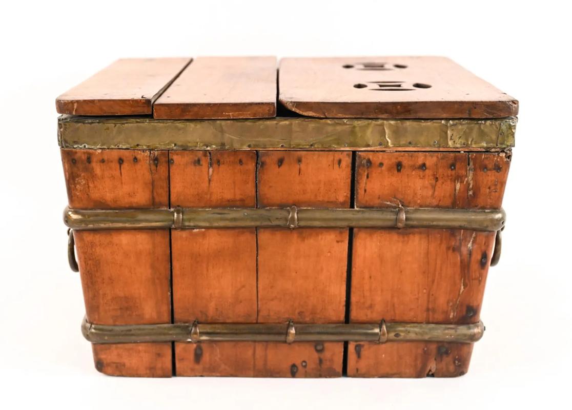 18th century Wood, Brass and Steel Chinese Ice Chest. 
Interior lined with galvanized steel. Exterior has brass slats and handles. Measures: 13.5