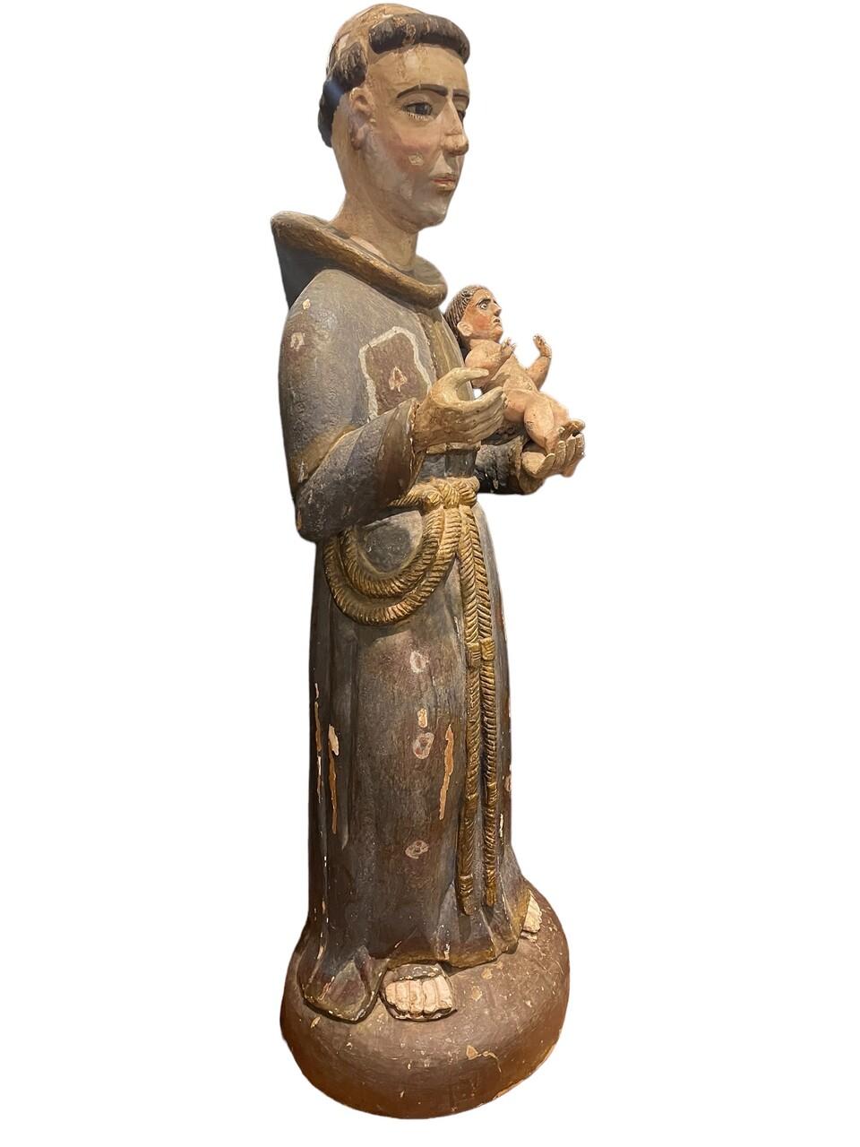 18th Century Wood Carved and Painted Santo. A polychrome Santo of St. Anthony
Some paint loss, looks to have had a split in the back that was filed in and touched up. Overall, very good vintage condition