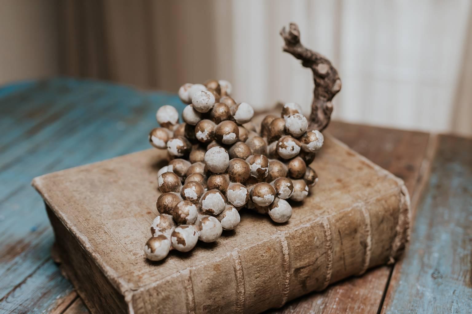 Very rare find these grapes, beautiful baroque object.