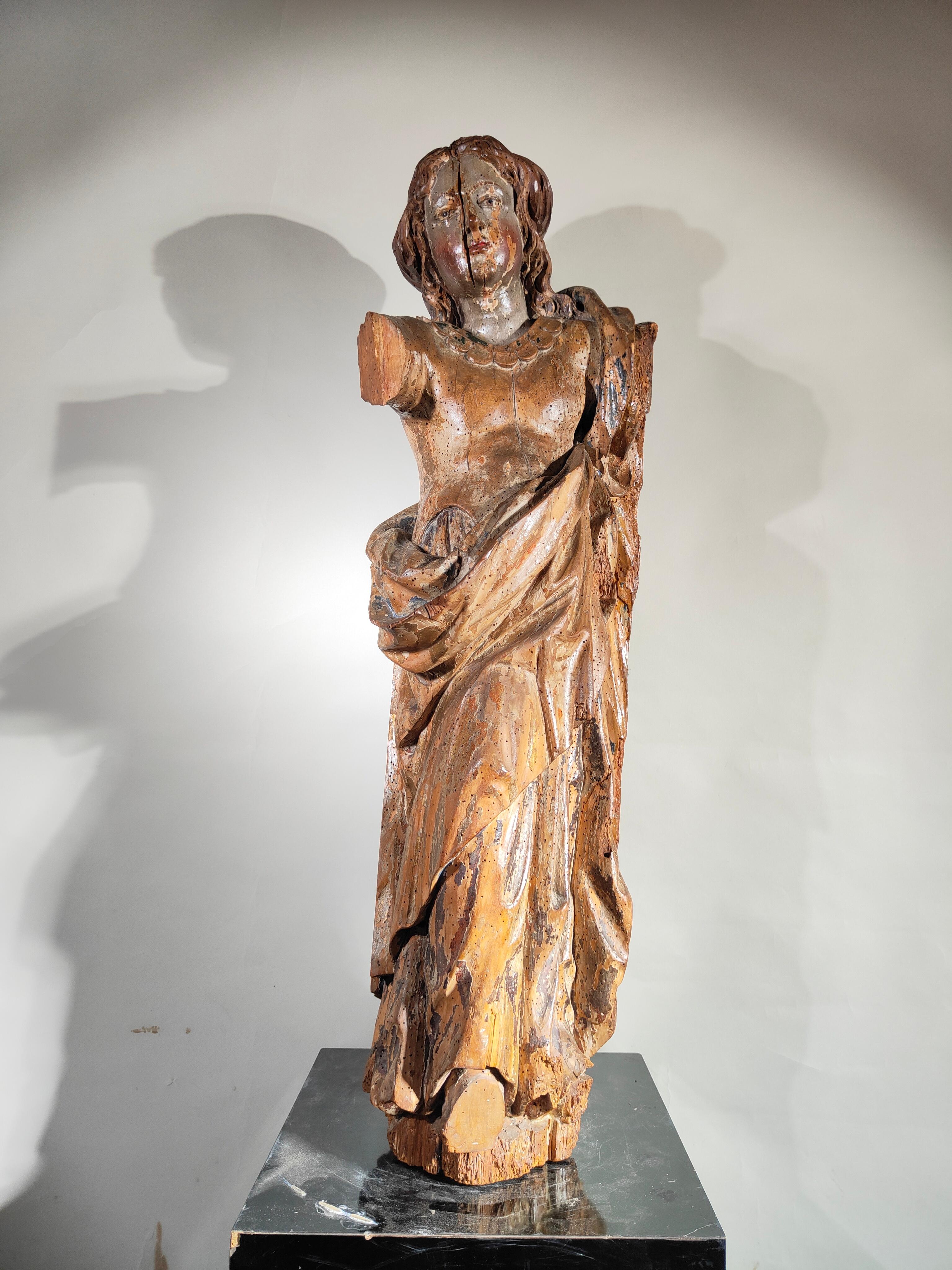 This exceptional sculpture, finely carved from solid wood and dating back to the 18th century, pays tribute to the devotion and artistic skill of its era. Depicting the Virgin Mary, the figure has been treated, consolidated, and meticulously