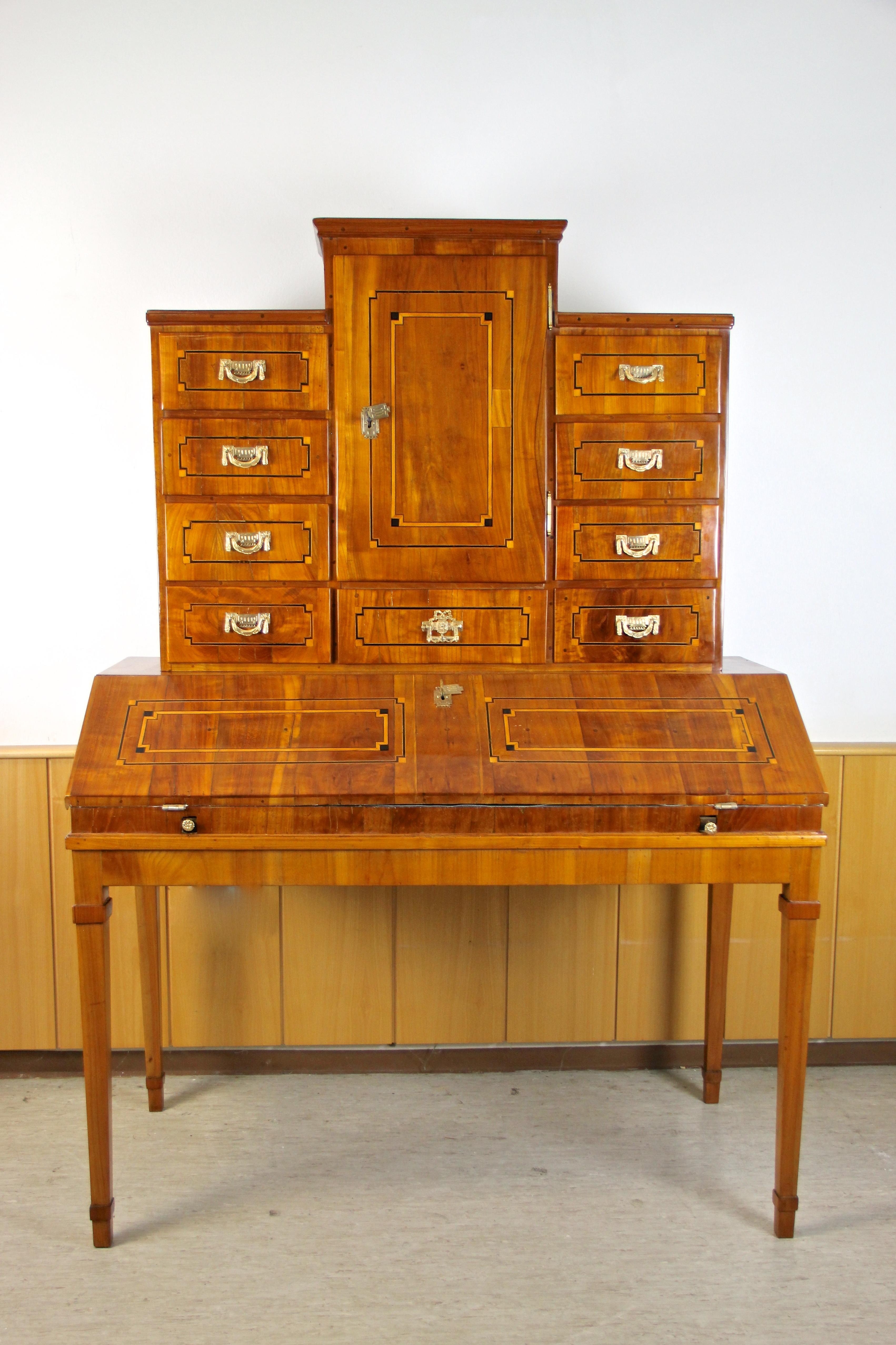 Extraordinary 18th century writing Secretaire made of fine cherry wood in the so-called 