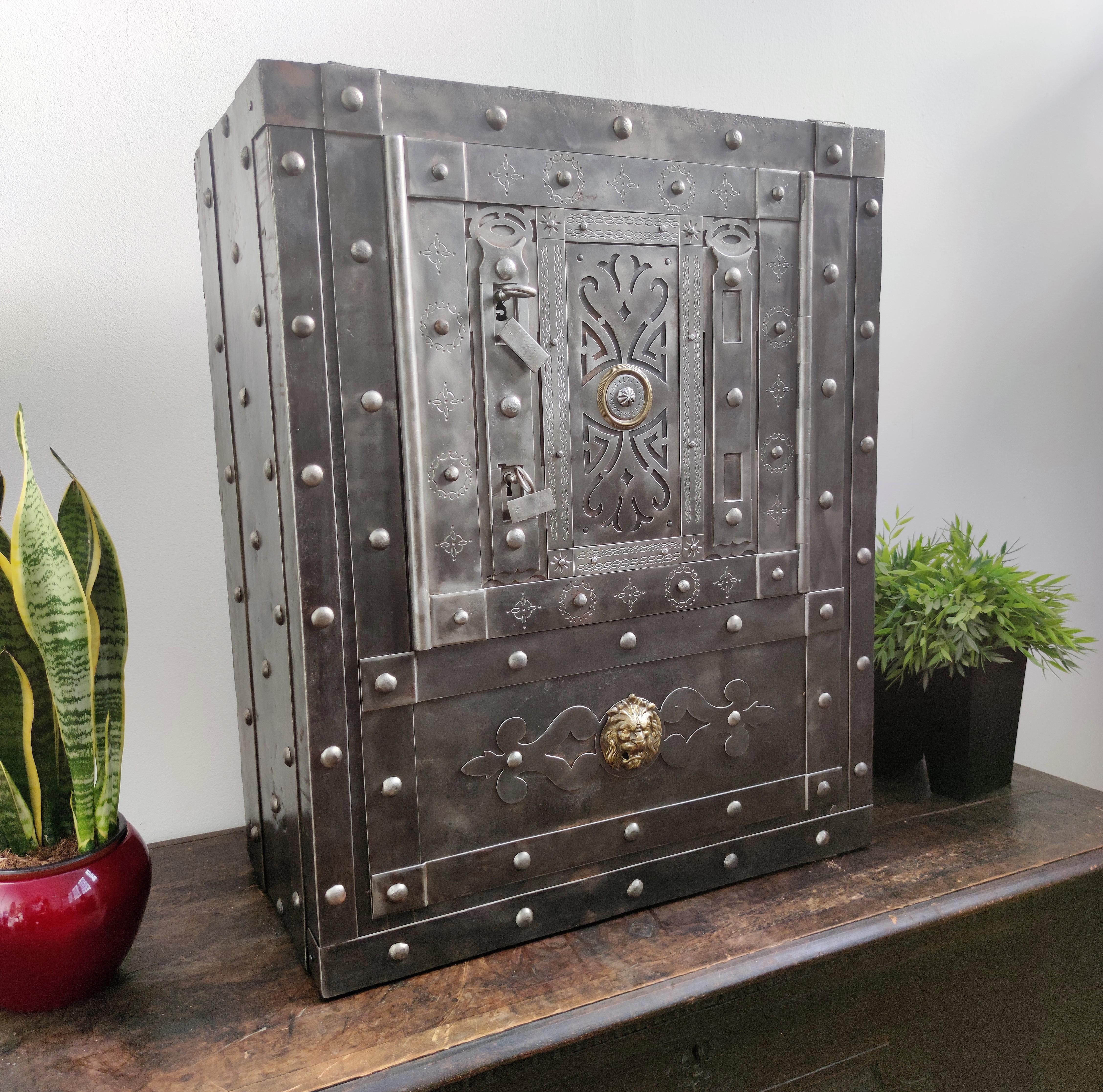 Beautiful and greatly decorated rare example of late 18th century Italian, Piedmontese, antique safe. This master blacksmith antique studded safe has a great metal color with patina of time and amazingly rich decorations, characterized by the