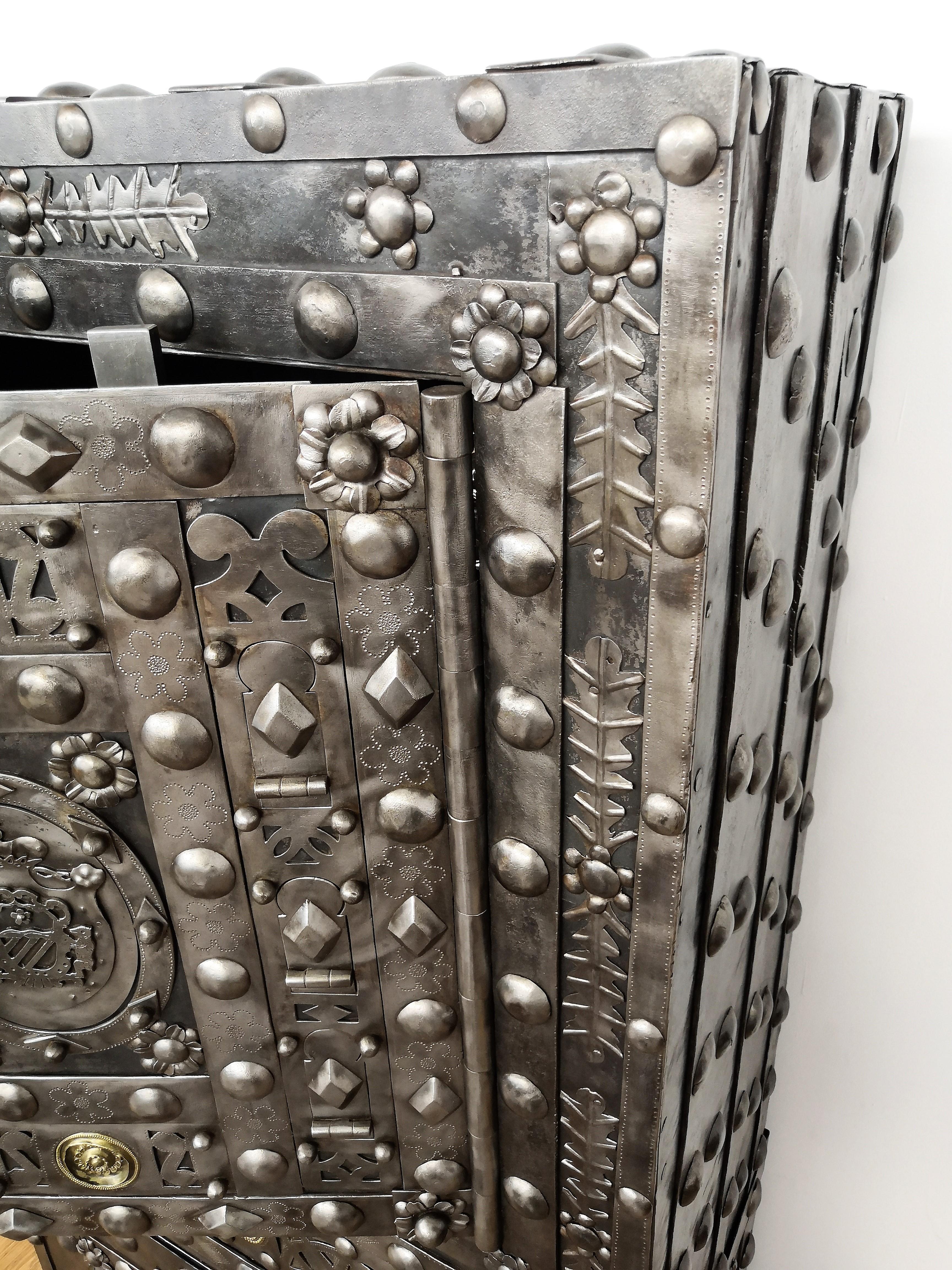 Northern Italian antique safe with typical all-around hobnails, dated circa 1790-1820, probably used inside a small feud fiefdom or fortified town castle of the Piedmont region, Italy's second-largest region where great craftsmanship and history
