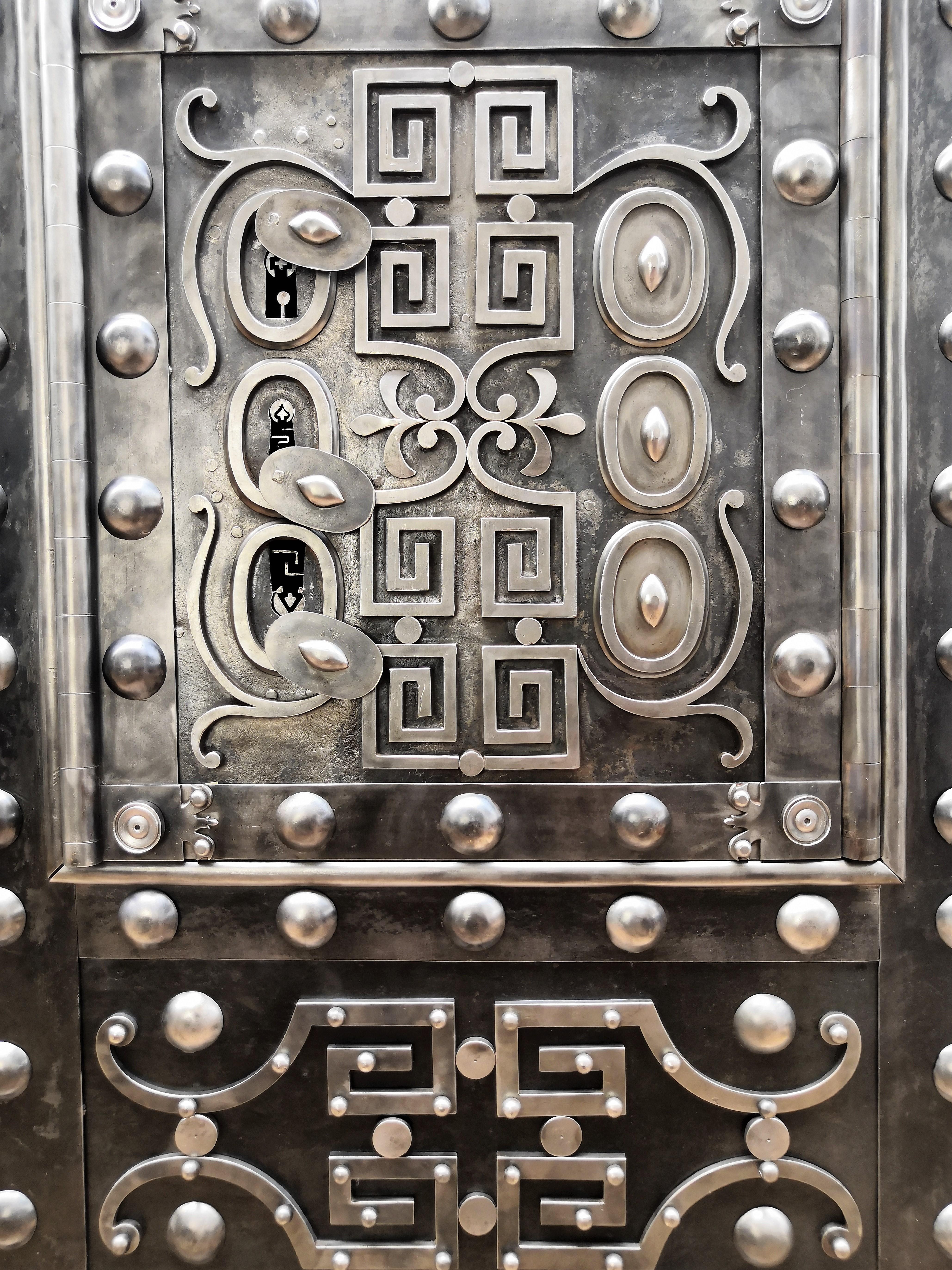 Northern Italian antique safe with typical all-around hobnails, dated circa 1790-1820, probably used inside a small feud fiefdom or fortified town castle of the Piedmont region, Italy's second-largest region where great craftsmanship and history