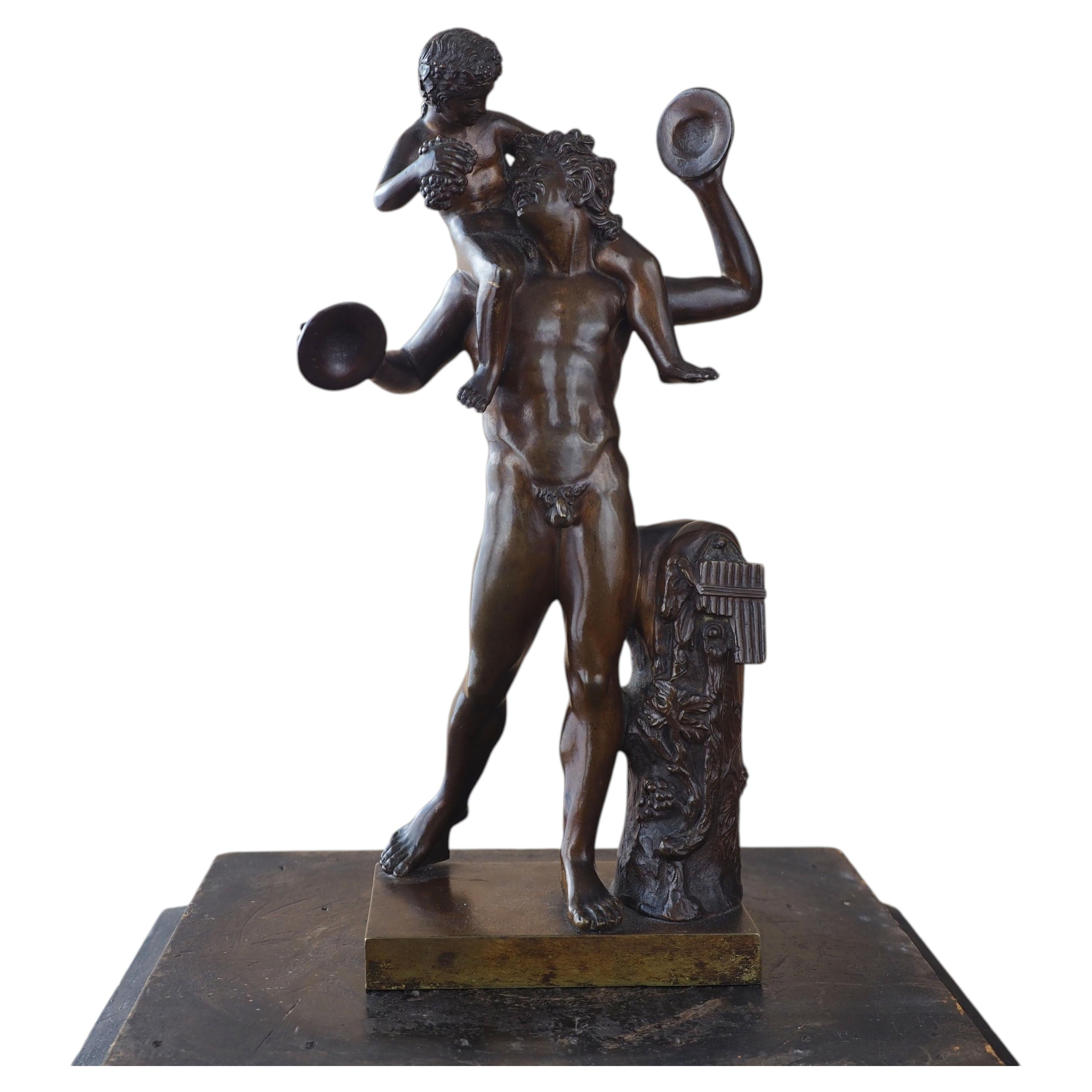 18th Italian bronze statuette of a Satyr and the Young Bacchus For Sale