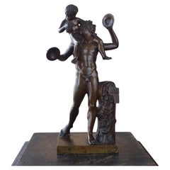 Statuette en bronze du XVIIIe siècle représentant un satyre et le jeune Bacchus
