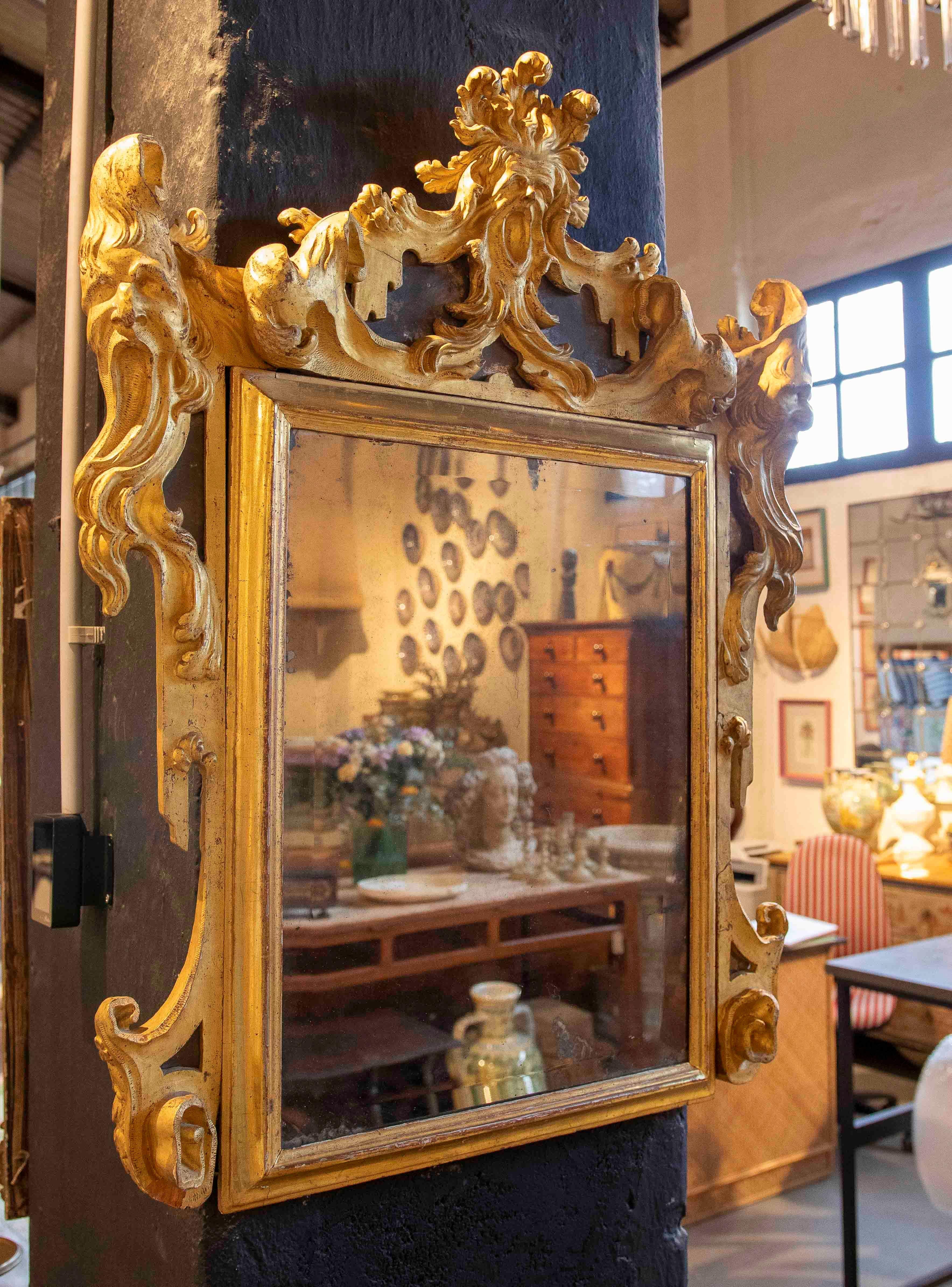 Spanish 18th Italian Rococo Mirror in Carved and Gilded Wood with Rocaille Trim For Sale