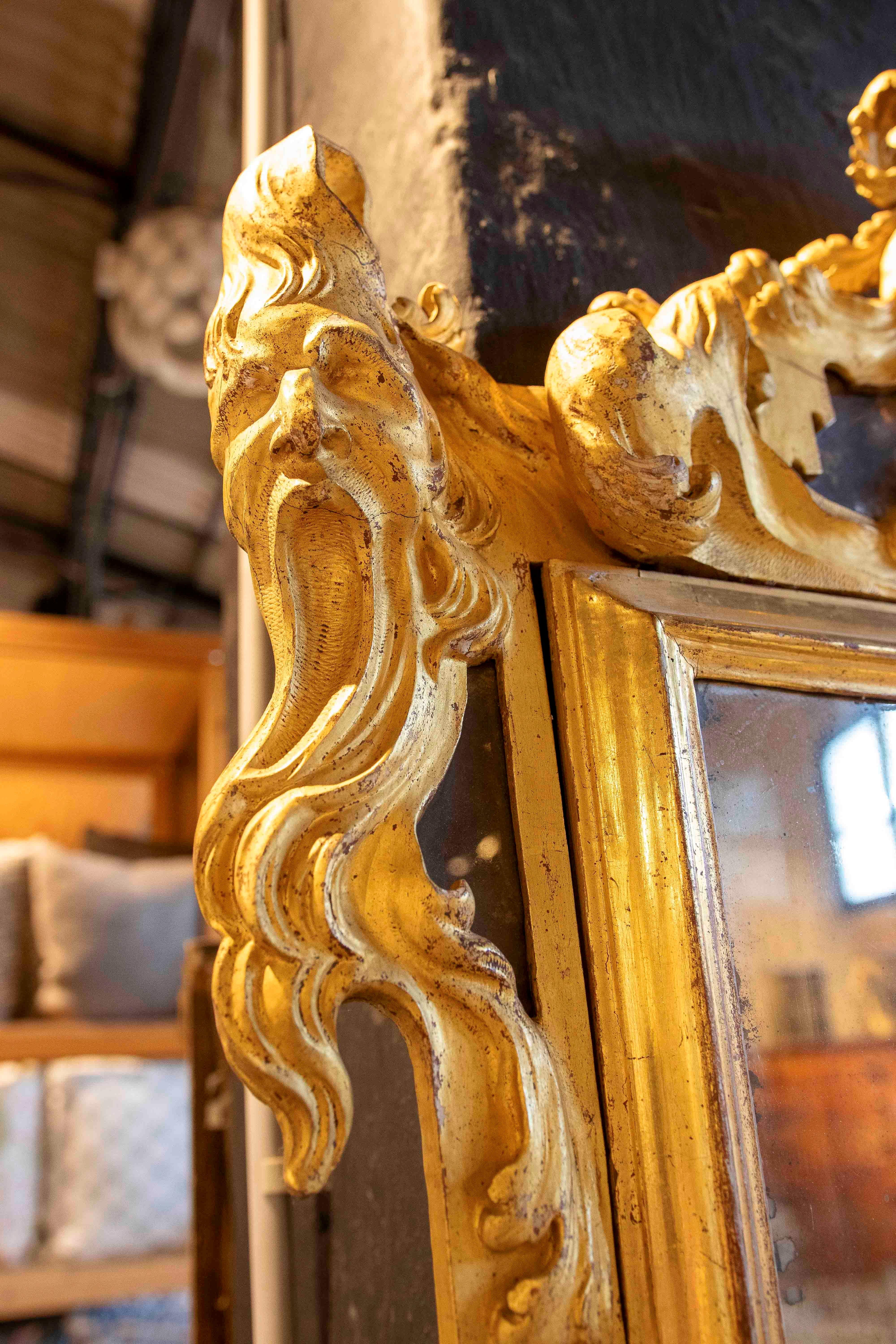 Gold 18th Italian Rococo Mirror in Carved and Gilded Wood with Rocaille Trim For Sale