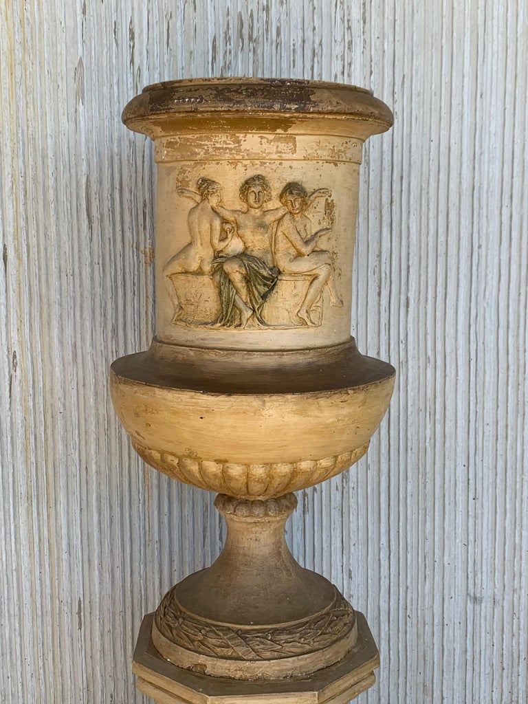 Monumental Italian neoclassical terracotta Campana-form garden urn . An extremely fine molded figural group of goddesses in back and front to the urn.
Being exposed to the outdoor elements has caused a beautiful patina, early 18th century.