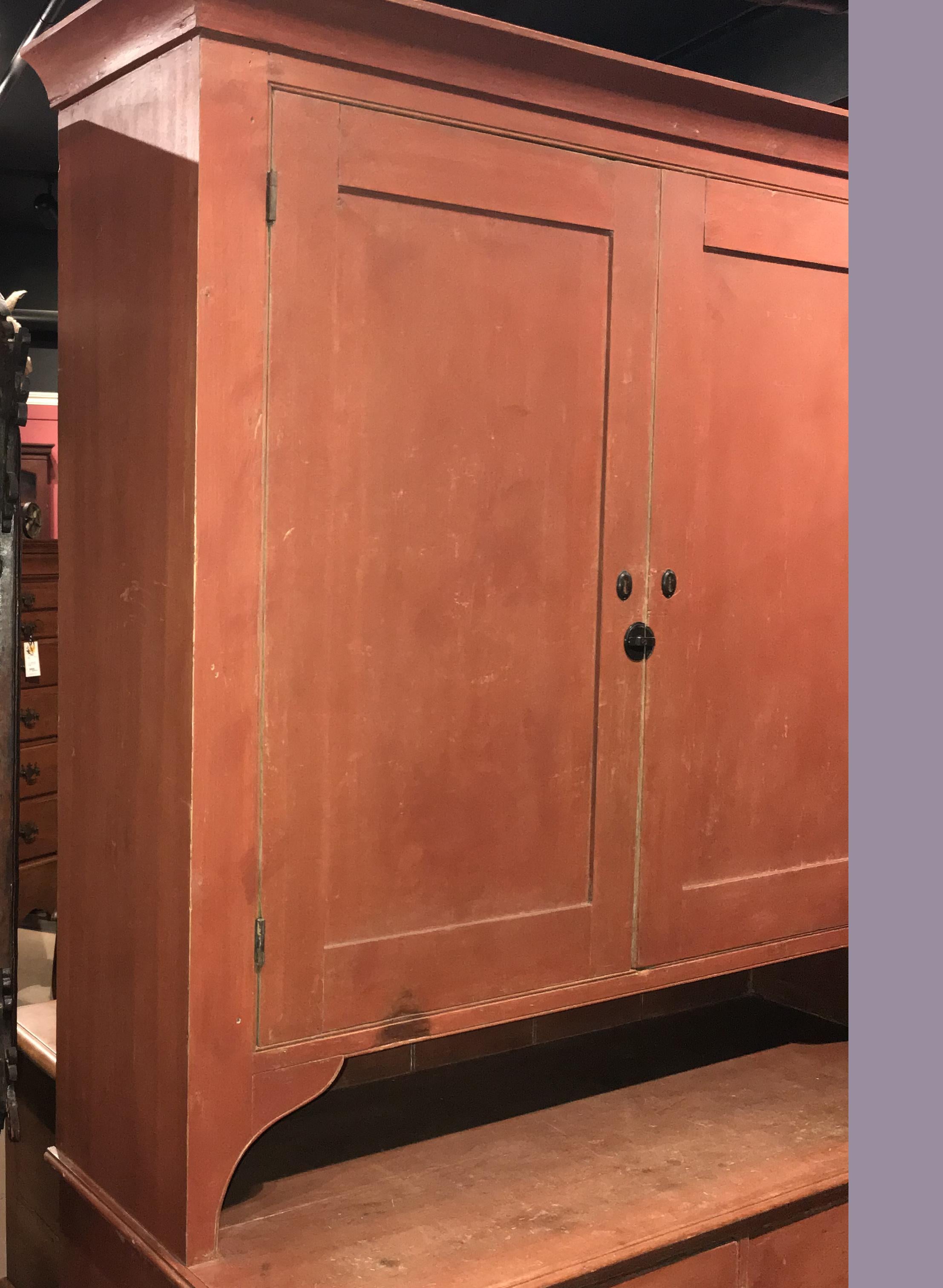 American 18th or 19th Century Pennsylvania Two Part Stepback Cupboard in Old Red Paint