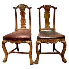 18th Pair of Swedish Baroque Giltwood Chairs.