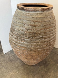 18th Spanish Terracotta Olive Jar With Layers Of Gray Aged Patina.