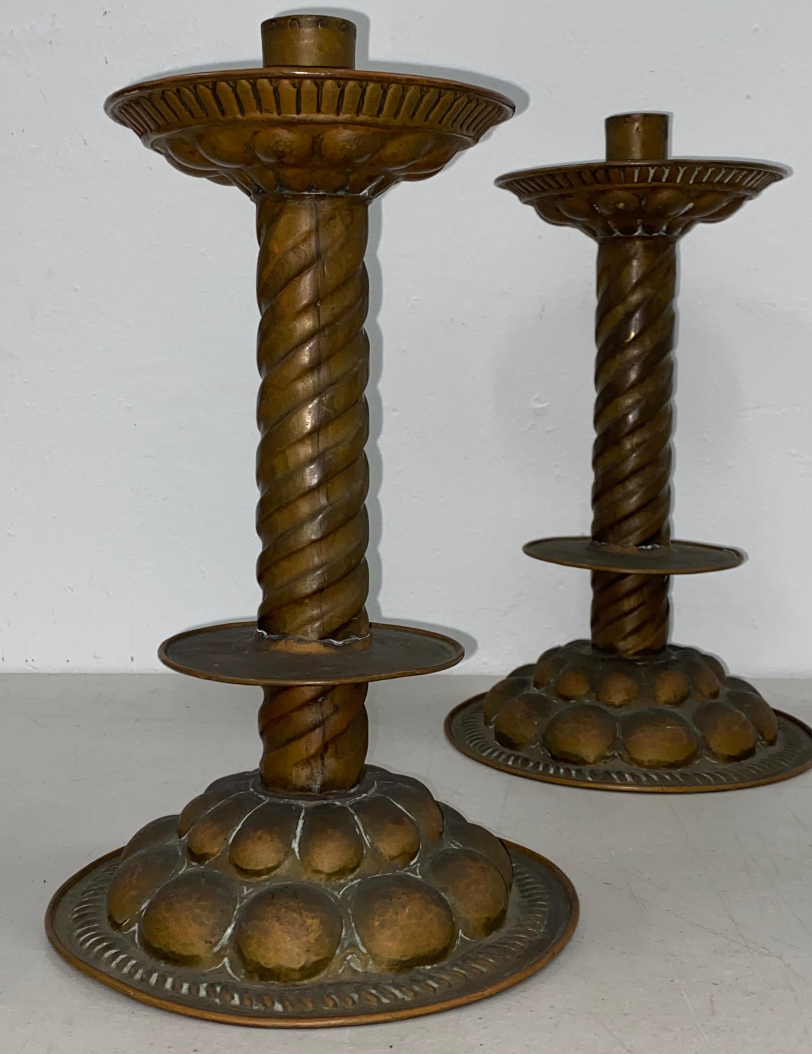 18th to 19th Century hammered copper candle holders

Measures: 8