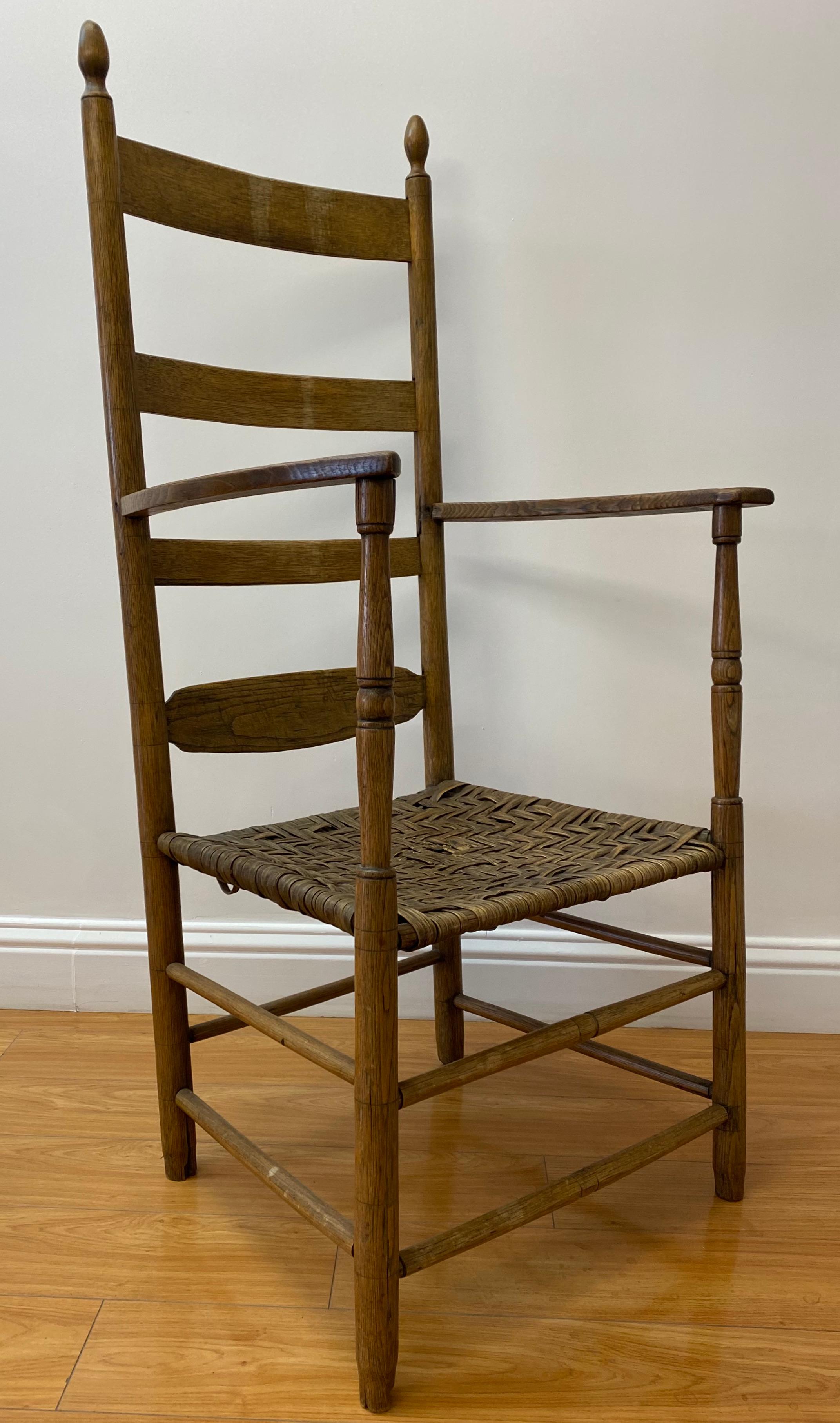 18th to 19th century ladder back chair with reed seat.

Hand made antique ladder back arm chair with hand woven reed seat

Measures: 22
