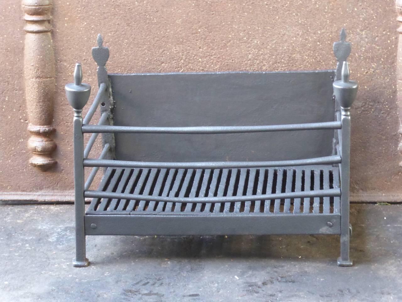 18th-19th century English Georgian fire grate made of cast iron and wrought iron.

We have a unique and specialized collection of antique and used fireplace accessories consisting of more than 1000 listings at 1stdibs. Amongst others, we always have