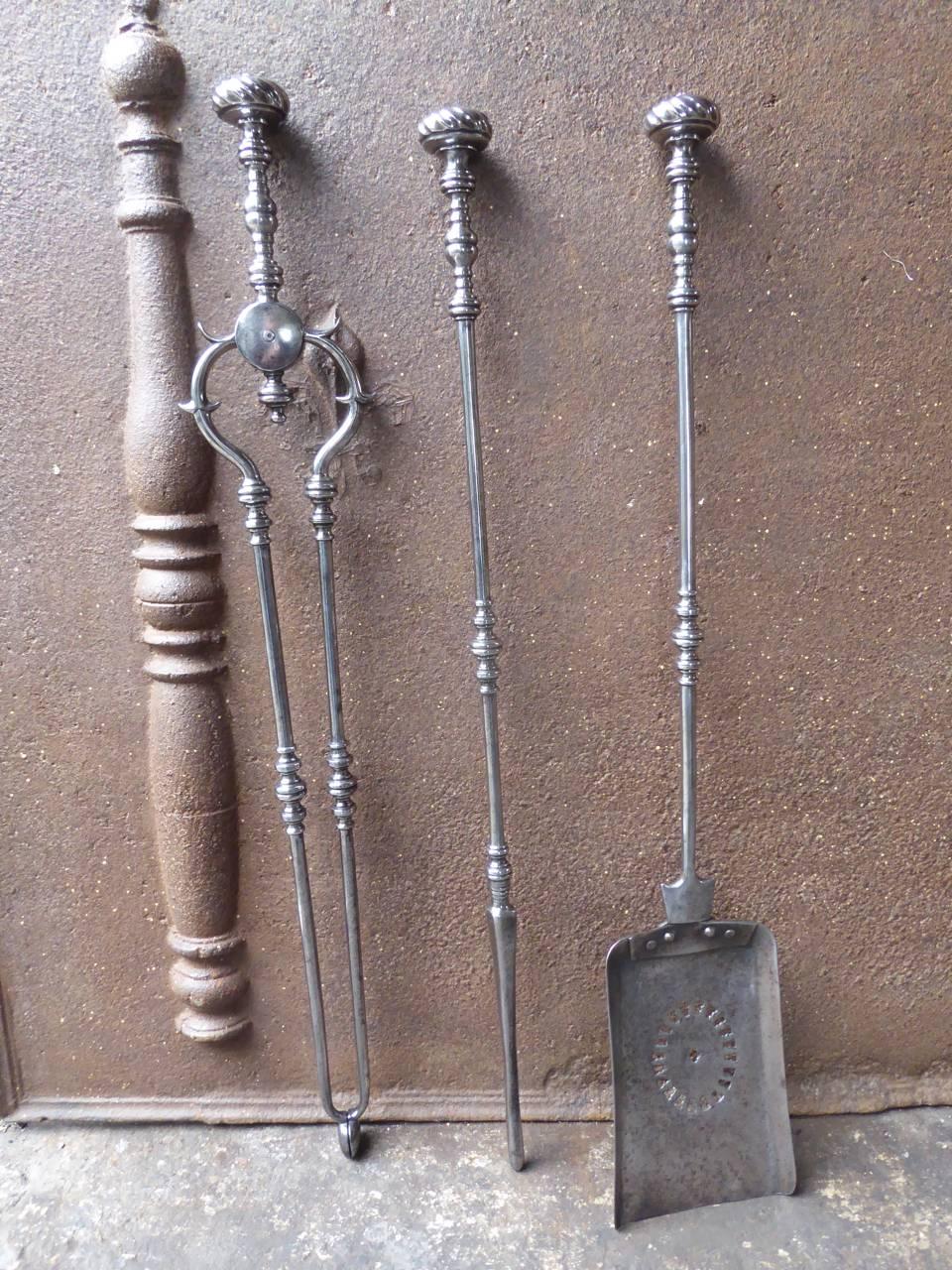 18th-19th century English Georgian fireplace tool set, fire irons made of polished steel.

We have a unique and specialized collection of antique and used fireplace accessories consisting of more than 1000 listings at 1stdibs. Amongst others, we