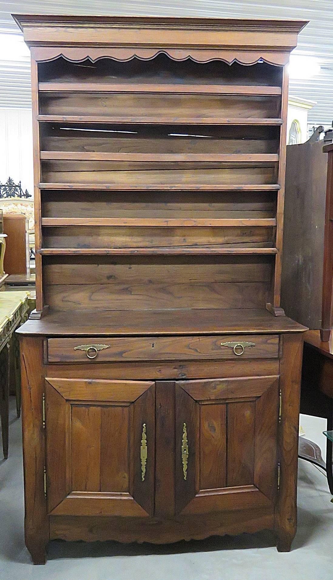 Antique 18th century hutch with six shelves, one drawer and two doors with one shelf.