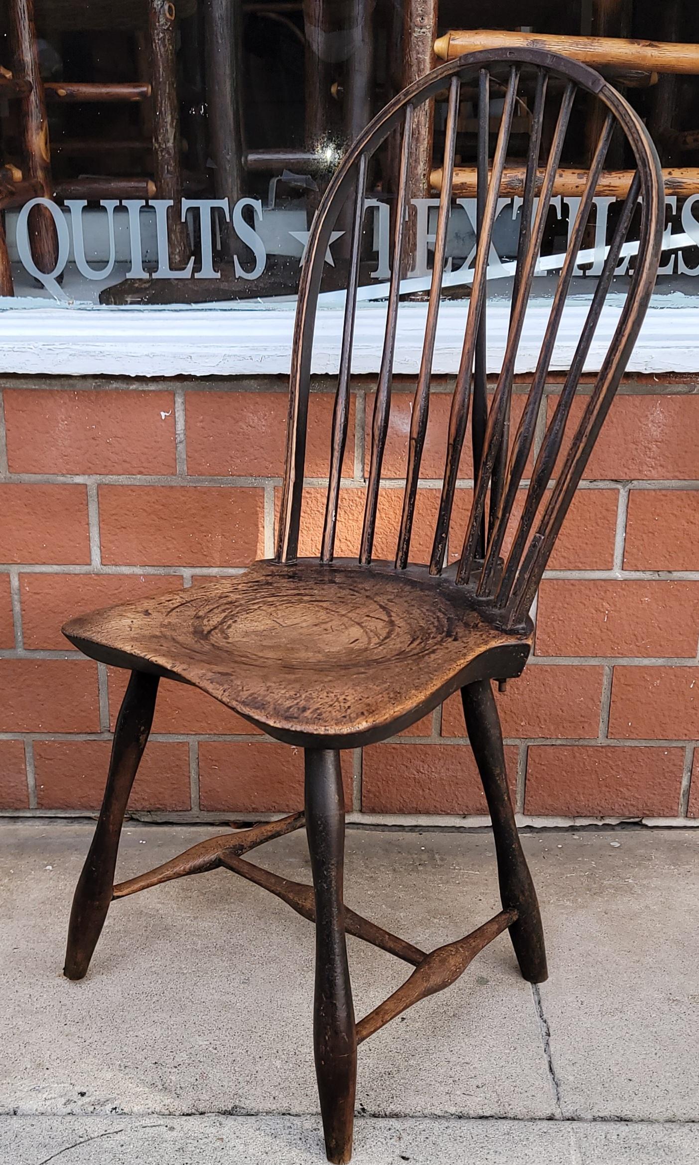 18Thc Original aged surface New England balloon back Windsor chairs in fantastic condition.These chairs have such wonderful form and patina.The saddle seats are most unusual and wonderful shape.These chairs have the most wonderful undisturbed