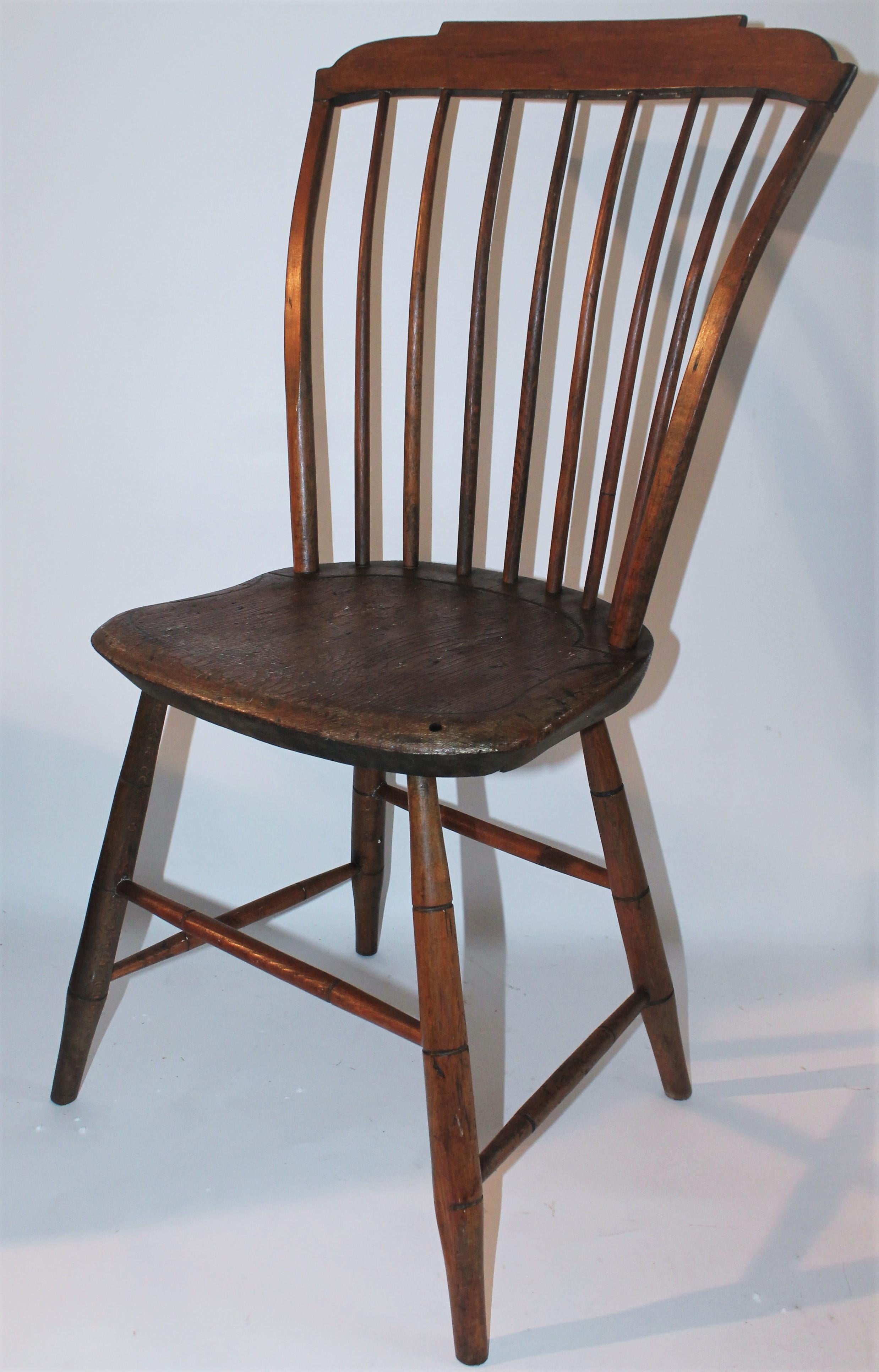 This fine bow back step down 18th century Windsor chair signed S,KILBURN ( maker ) on base of the chair. This chair is in good sturdy condition. Fantastic form and surface.