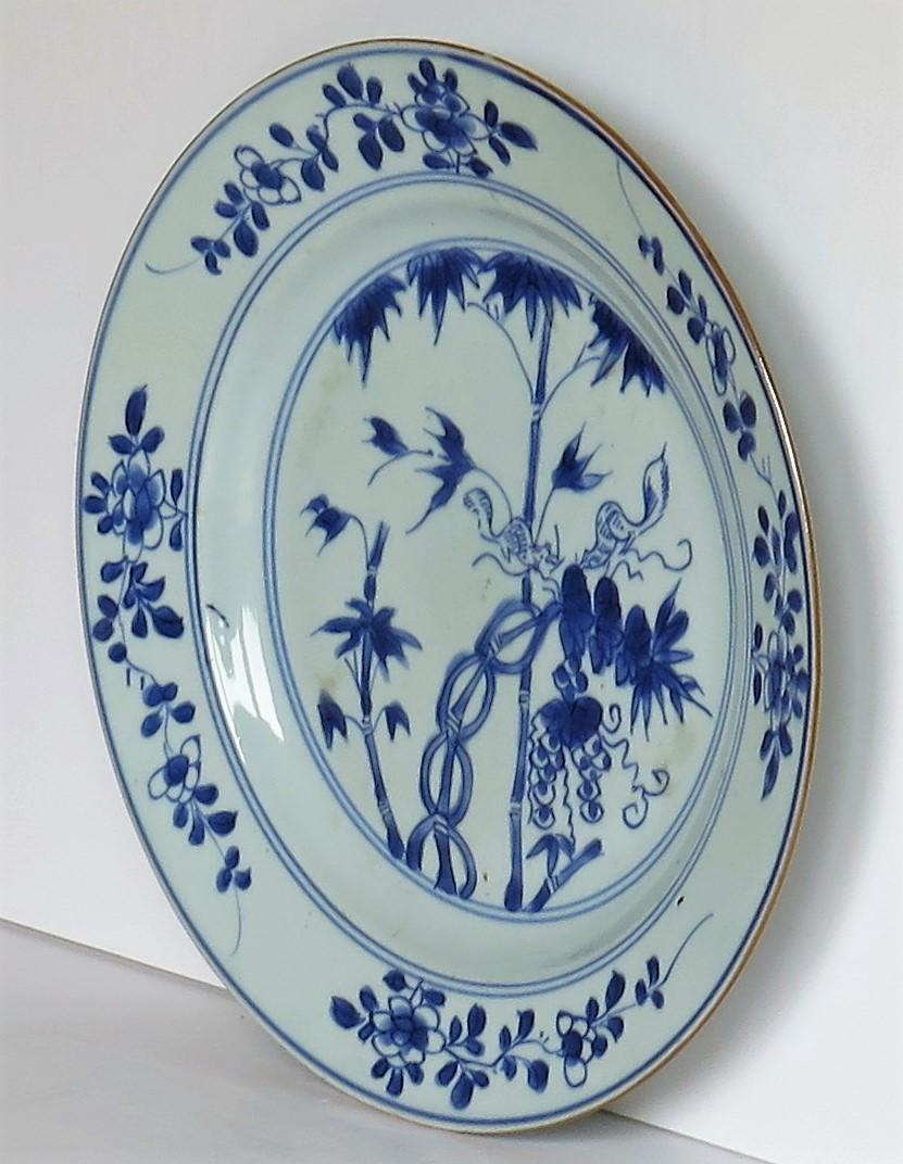 This is a beautiful hand painted blue and white Chinese porcelain plate, dating to the first half of the 18th century, circa 1720-1740, Qing dynasty.

The plate is well potted, and has been hand decorated in varying shades of cobalt 'steel' blue.