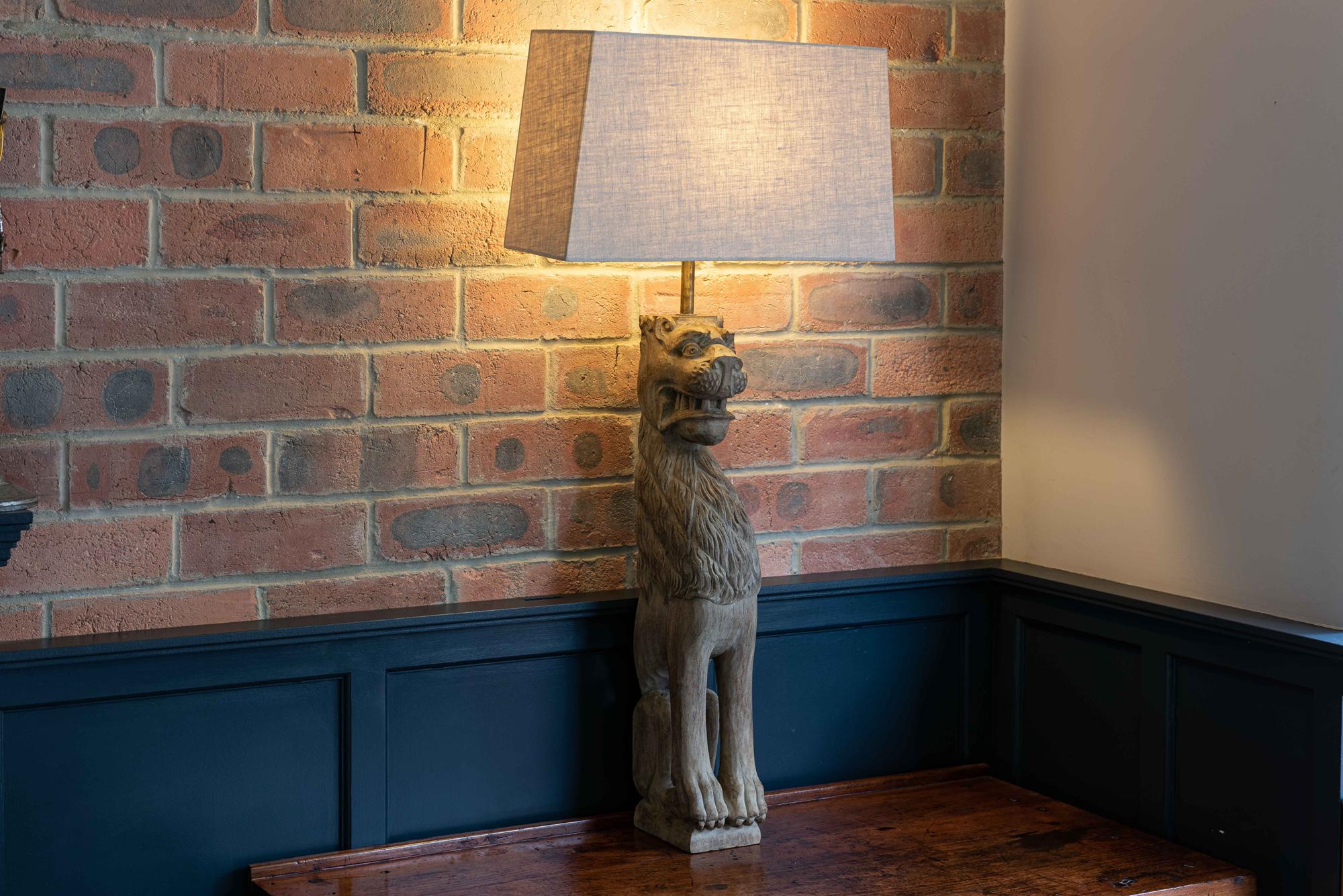18th century English large carved oak lion table lamp
circa 1760.

Reclaimed from a church Pew end, bleached and adapted.
OKA Linen shade included.

Rewired and pat tested

Measures: H 75 x 15 W x 10 D cm

With shade 92 H x 45 W x 15 D cm.