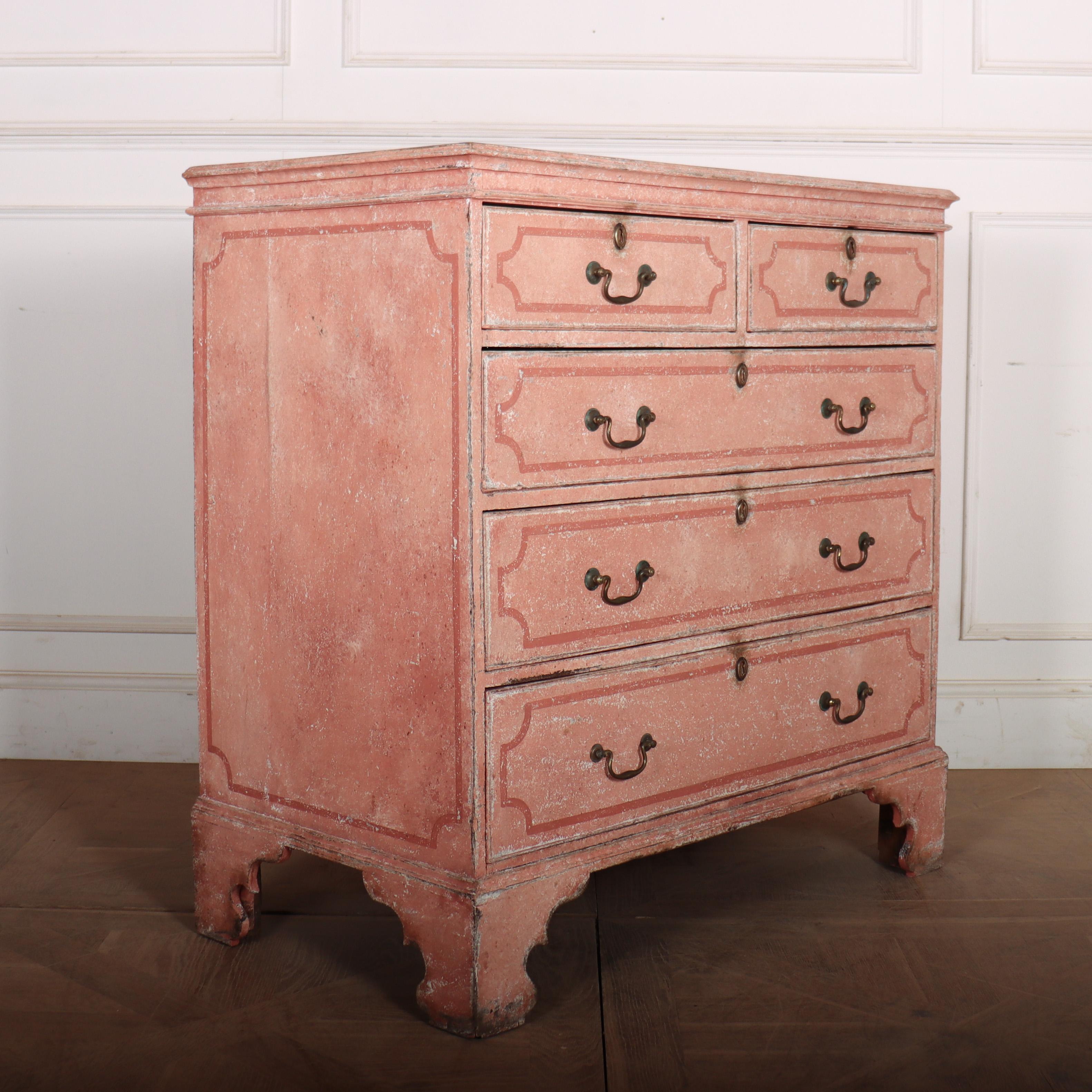 Wonderful 18th Century English painted oak chest of drawers with a decorative paint finish. 1780