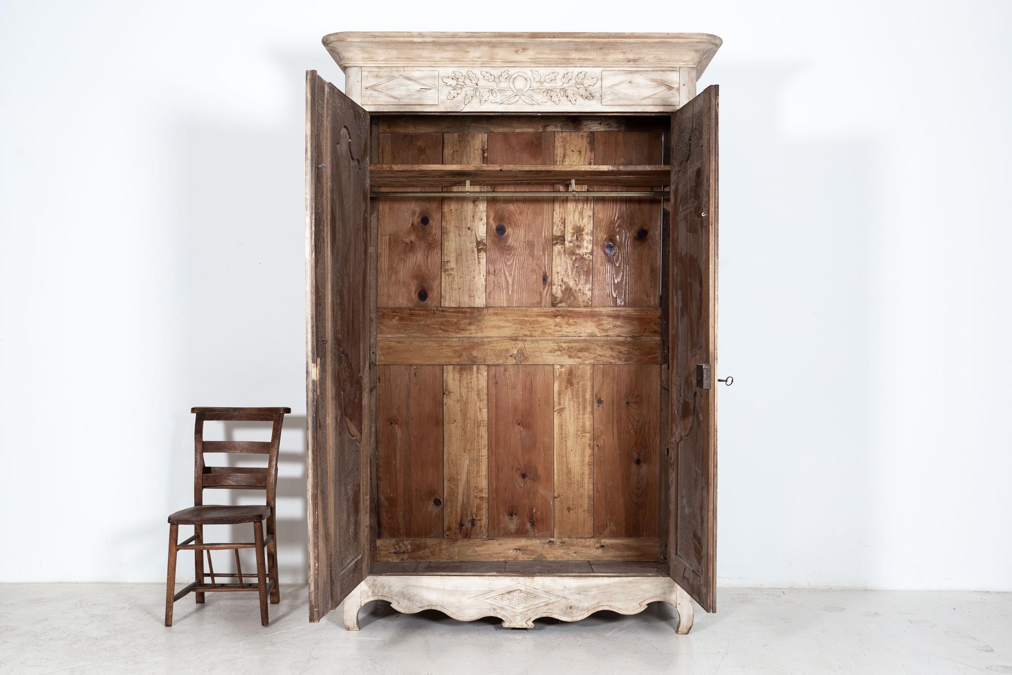 Circa 1740

Early 18thC French Bleached Walnut Provincial Armoire

With adjustable shelf, Hanging rail and key.

Sourced from the South of France

Sku 777

W155 x D56 x H228