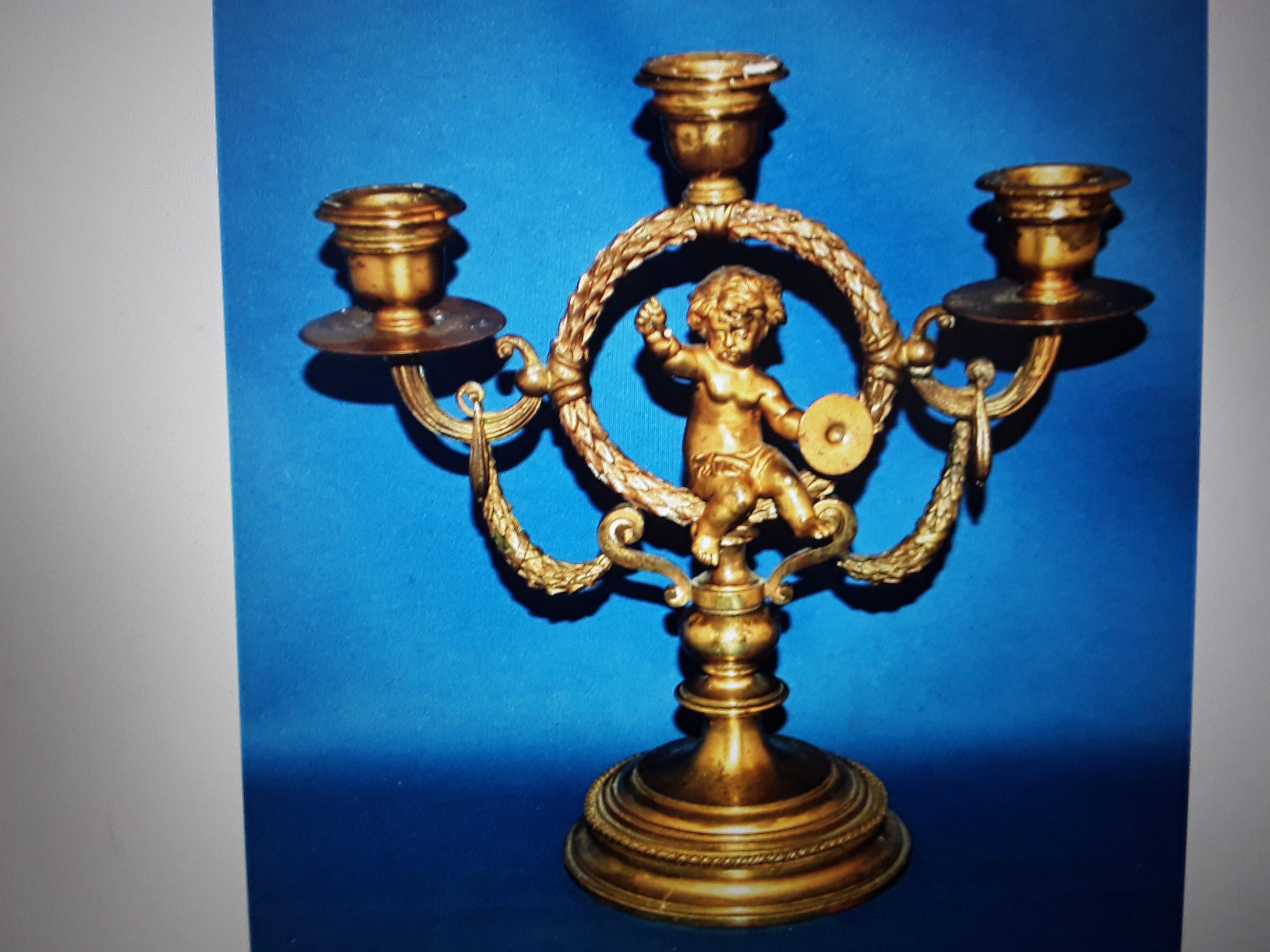 Quite Impressive 18thc French Louis XVI Gilt Bronze Musical Cherub Baby Candelabra. Rare piece! and a lovely candelabrum.
