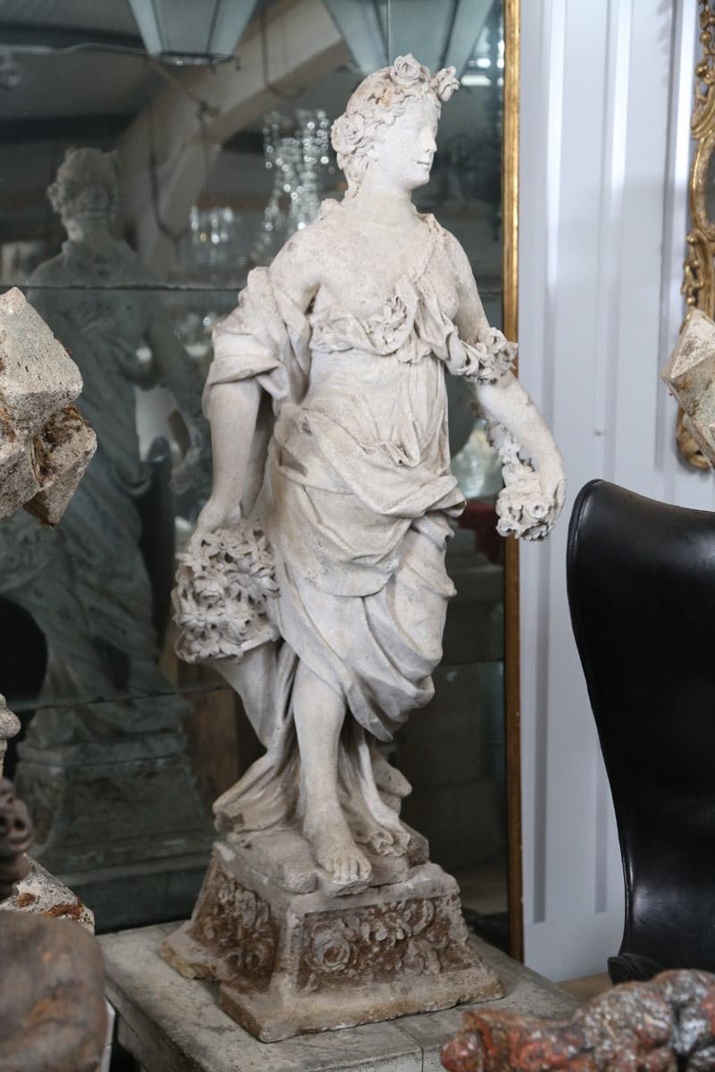 Mid-18th century French stone statue of flora originally from a chateau in Dijon, France.