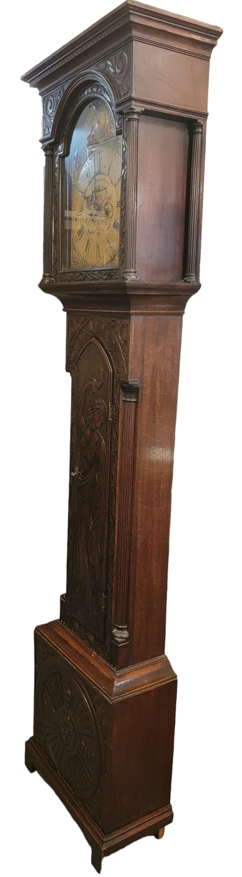 18thc Hand Made Wooden Grandfather Clock. Wonderful festooned ornate decoration. Sleek Design, great old original wood. The inner working is all intact. The weights are available. The clock just needs to get cleaned and adjusted. 
