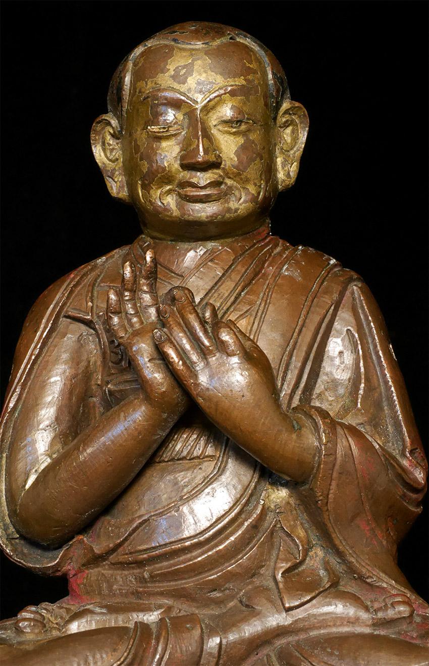 Antique Tibetan Monk- Quality casting- 18thC or earlier. 5.25 inches tall and HEAVY, 6 5/8 inches tall on a custom stand. Very well cast. Came from a very impressive New York collection that was forced to be broken up due to a divorce. I picked up a