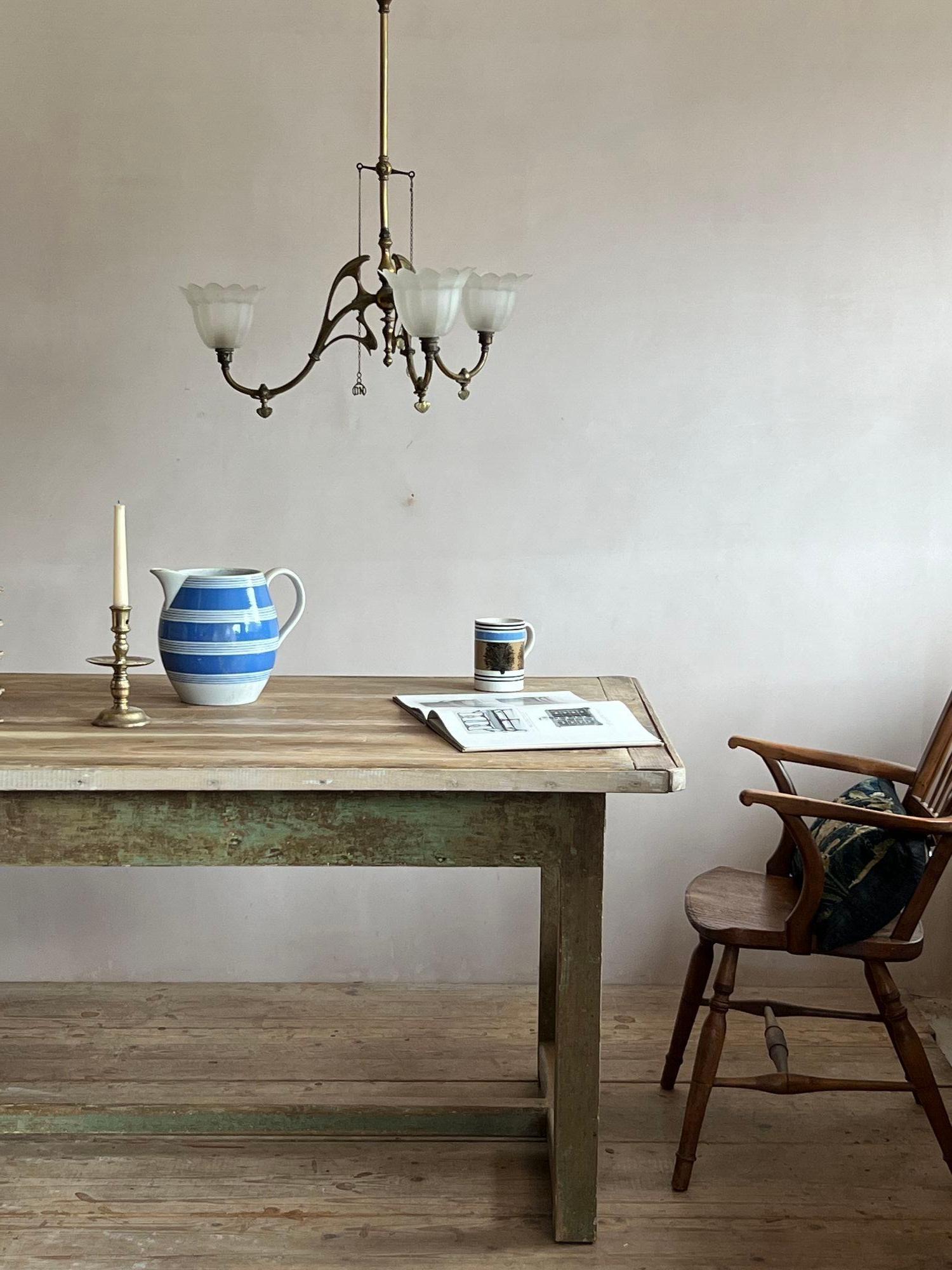 An excellent 18thC country table from the North of England, in the county of Westmorland. An interesting vernacular variation is the loose top which can be flipped over to use both sides. Originally one for working/baking etc and the other for
