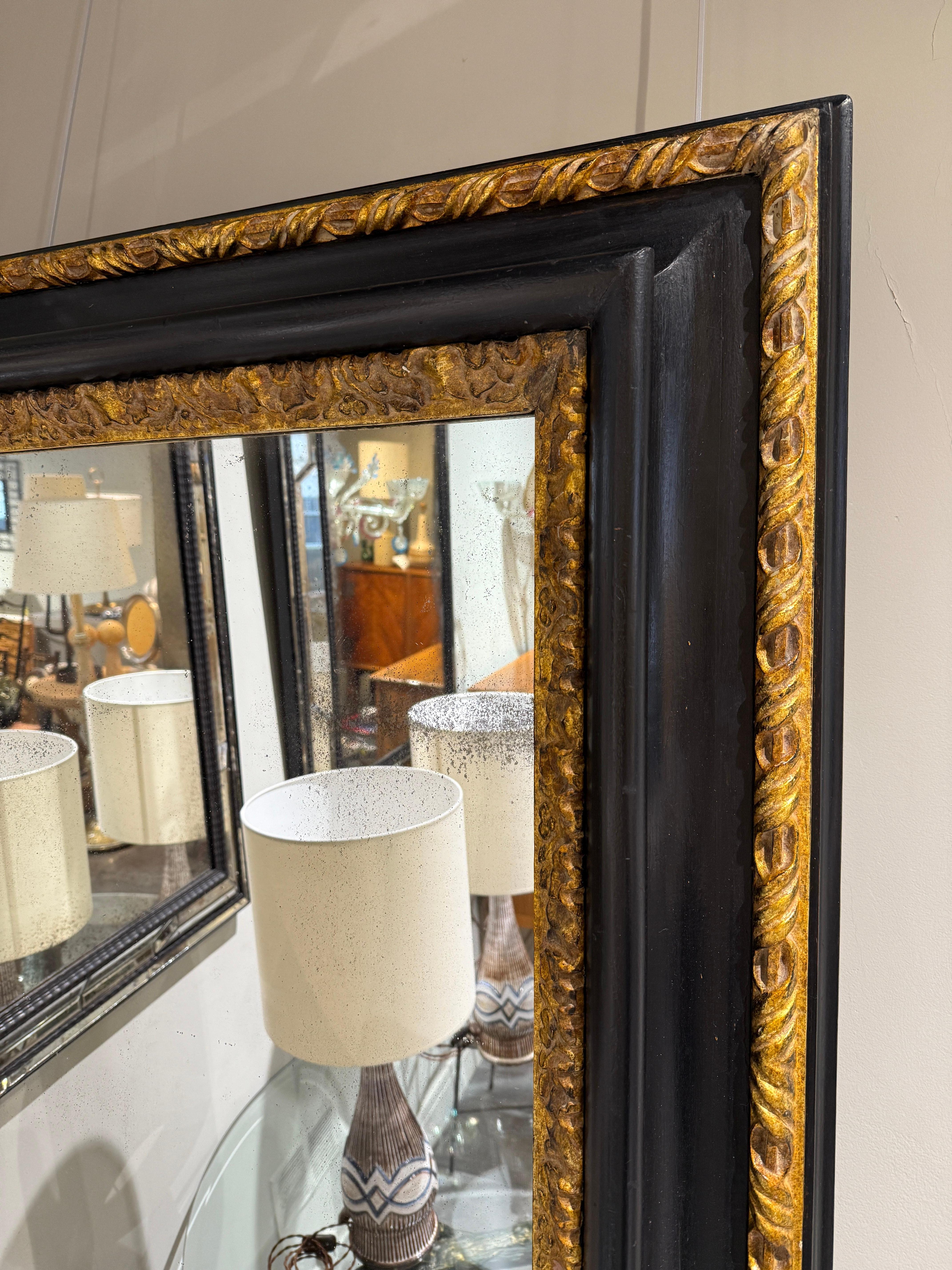 Impressive wooden mirror with gilt decoration Tuscany 18eme 
Mercury mirror 


