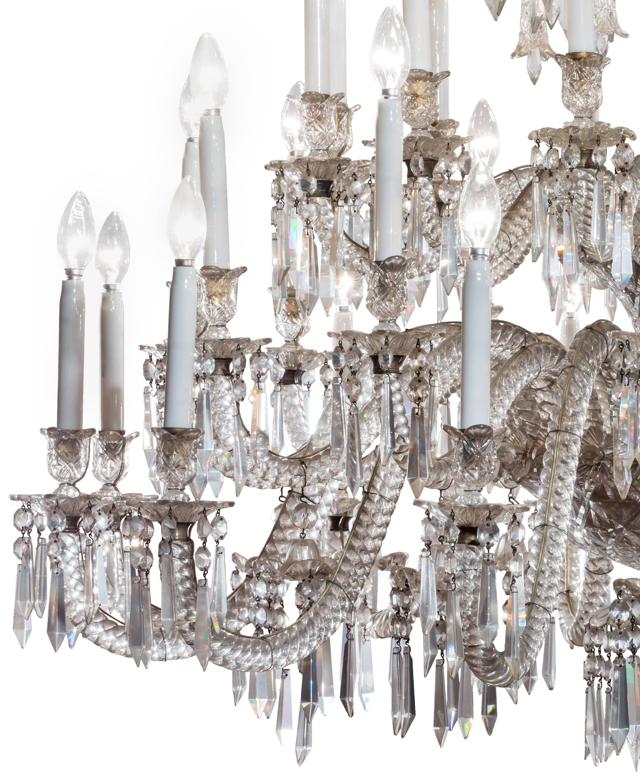 A grand 19th century French Baccarat crystal 36-light, triple-tier chandelier. At over one meter high and wide, this large and impressive style of crystal chandelier was especially popular during the second half of the nineteenth century, when