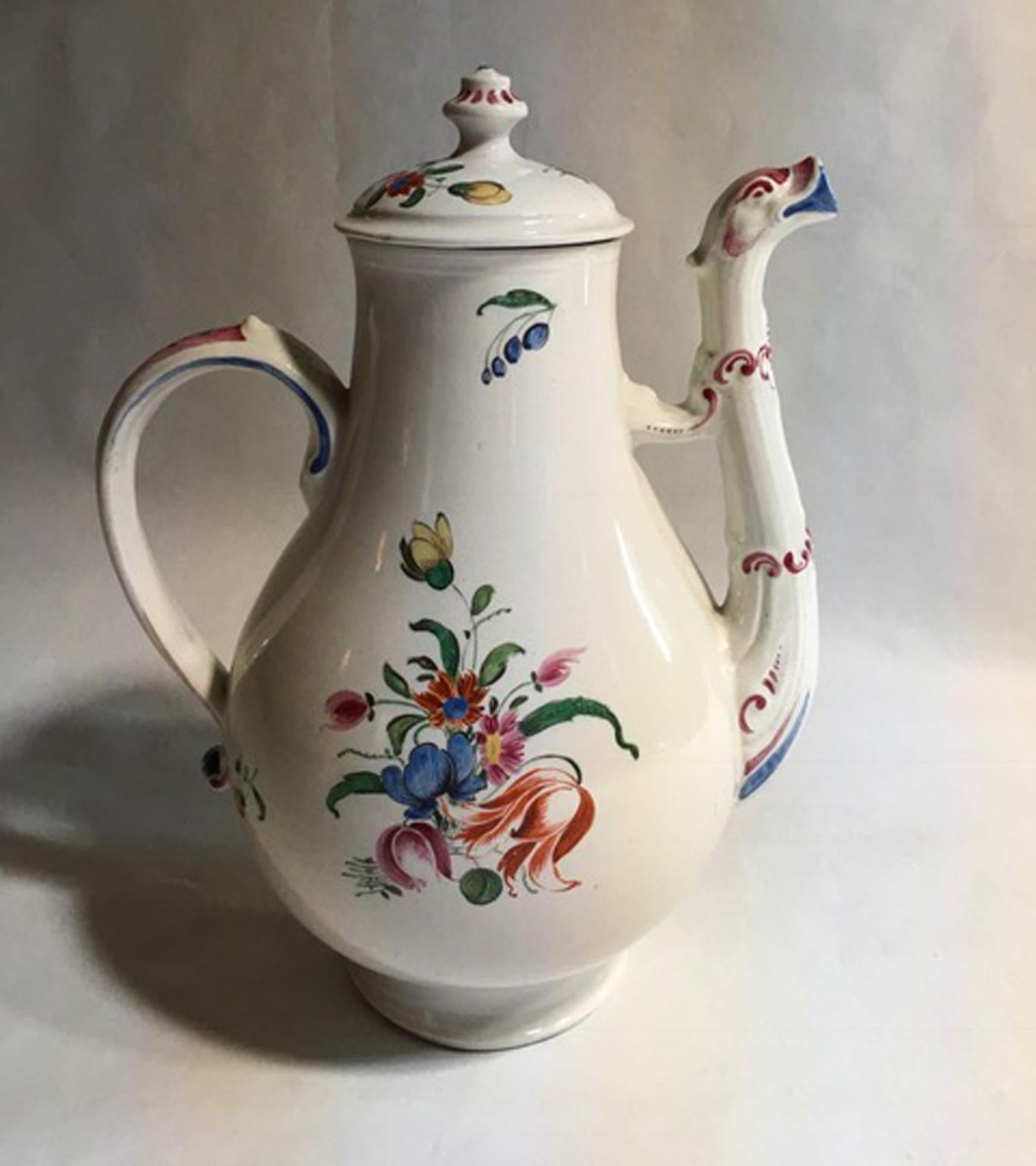 This is a beautiful piece in Italian porcelain handmade by Richard Ginori, 18th century. The high quality of this Italian production of Doccia, is recognizable at first glance. The flower decoration with orange tulip and a multi-color country