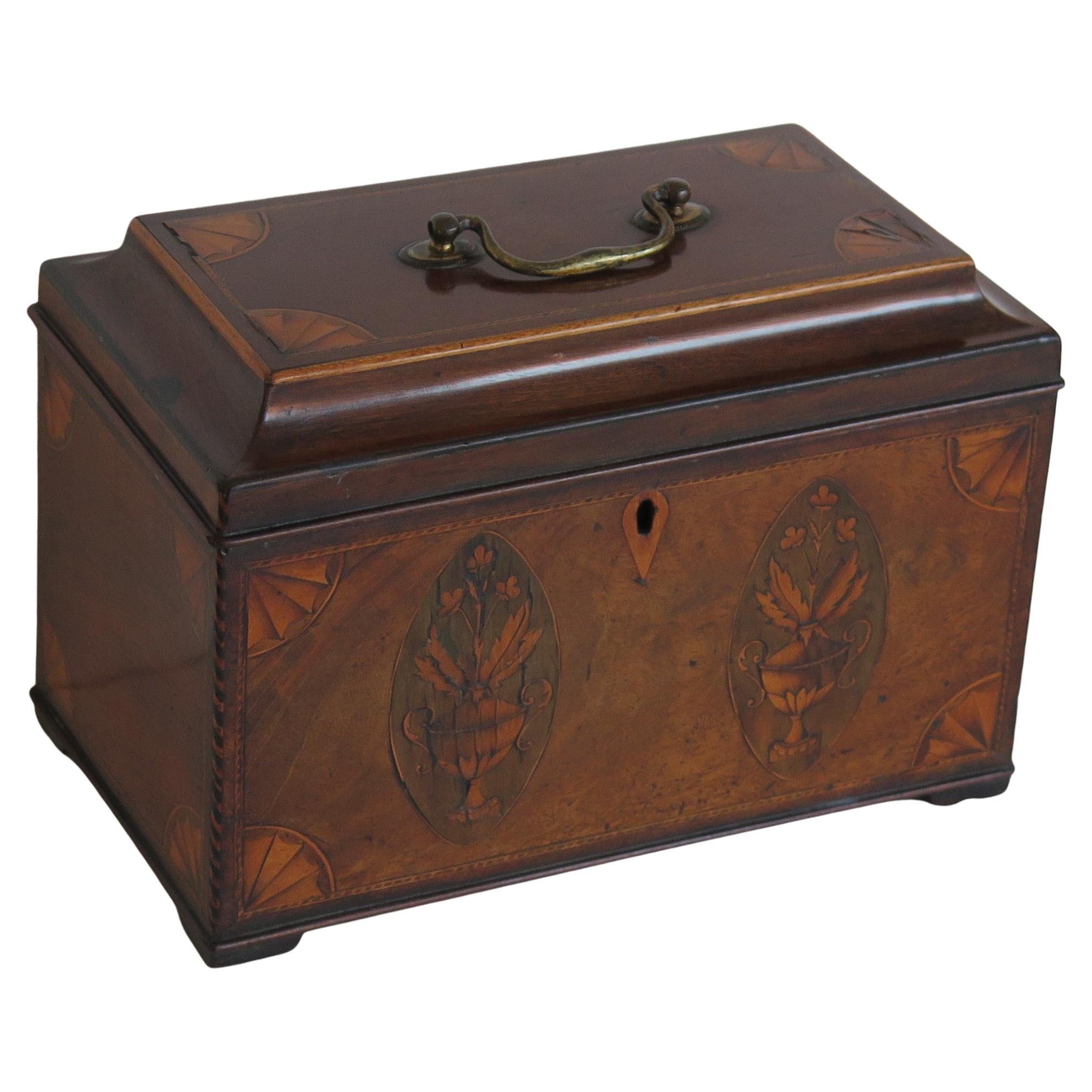 A very beautiful, fine quality, inlaid Tea Caddy from the English Georgian, Sheraton Period, Circa 1780.

The Tea Caddy is all handmade with very fine quality features;
* Beautifully chosen figured hardwoods.
* Exceptional inlays of Shells, Fan