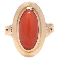 Anillo de bisel de coral oblongo 18Y