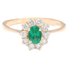 18Y Oval Emerald & Diamond Halo Ring