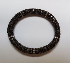 Bracciale flessibile in oro bianco con diamante nero da 19 carati