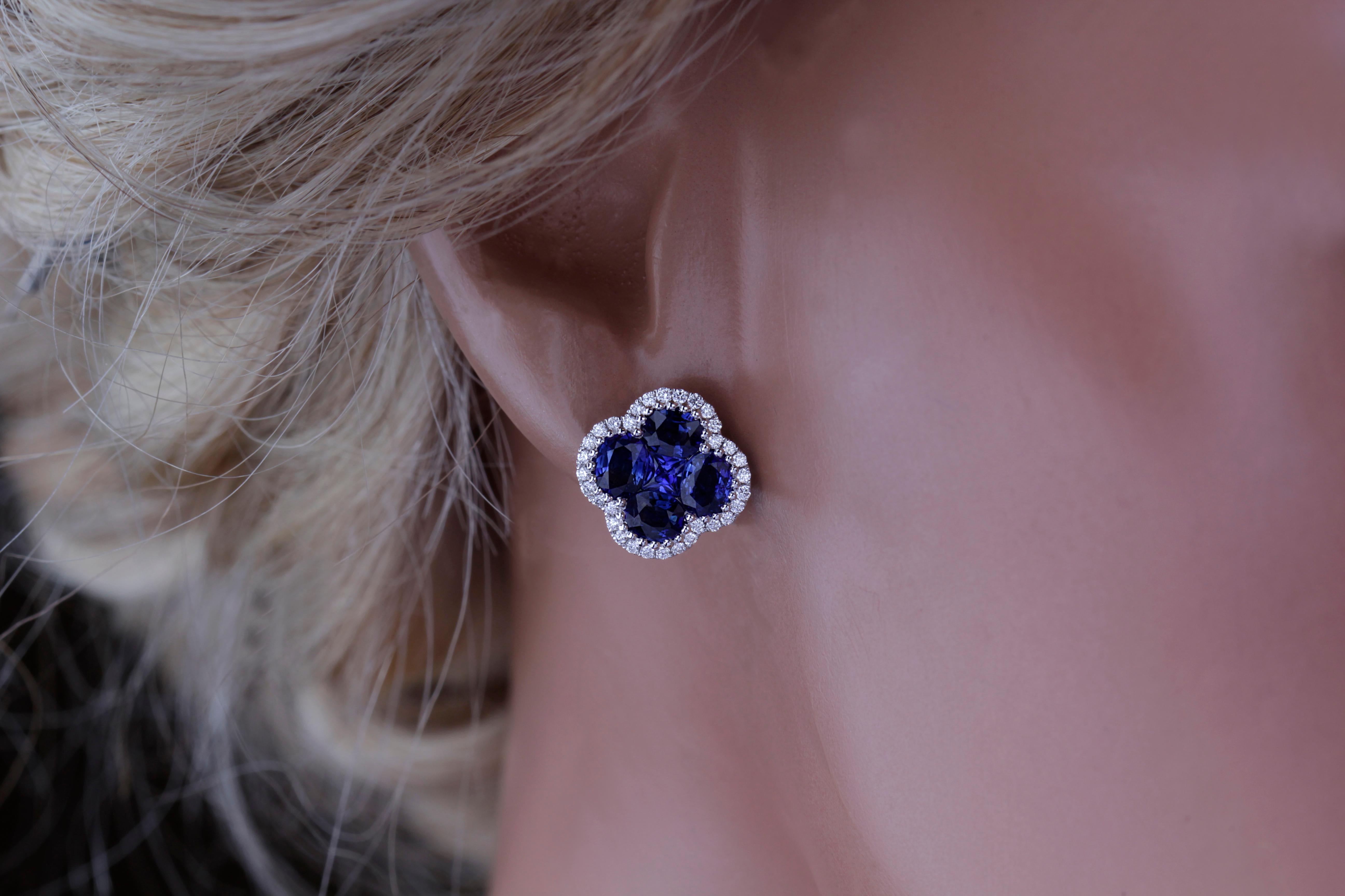 These earrings feature 10 sapphires carefully arranged in a clover shape (4 oval and 1 square cut) totaling 1.90 carats, inside a halo of round white diamonds totaling 0.25 carats. Set in 18k white gold.
Suggested retail price $7,726

DiamondTown is