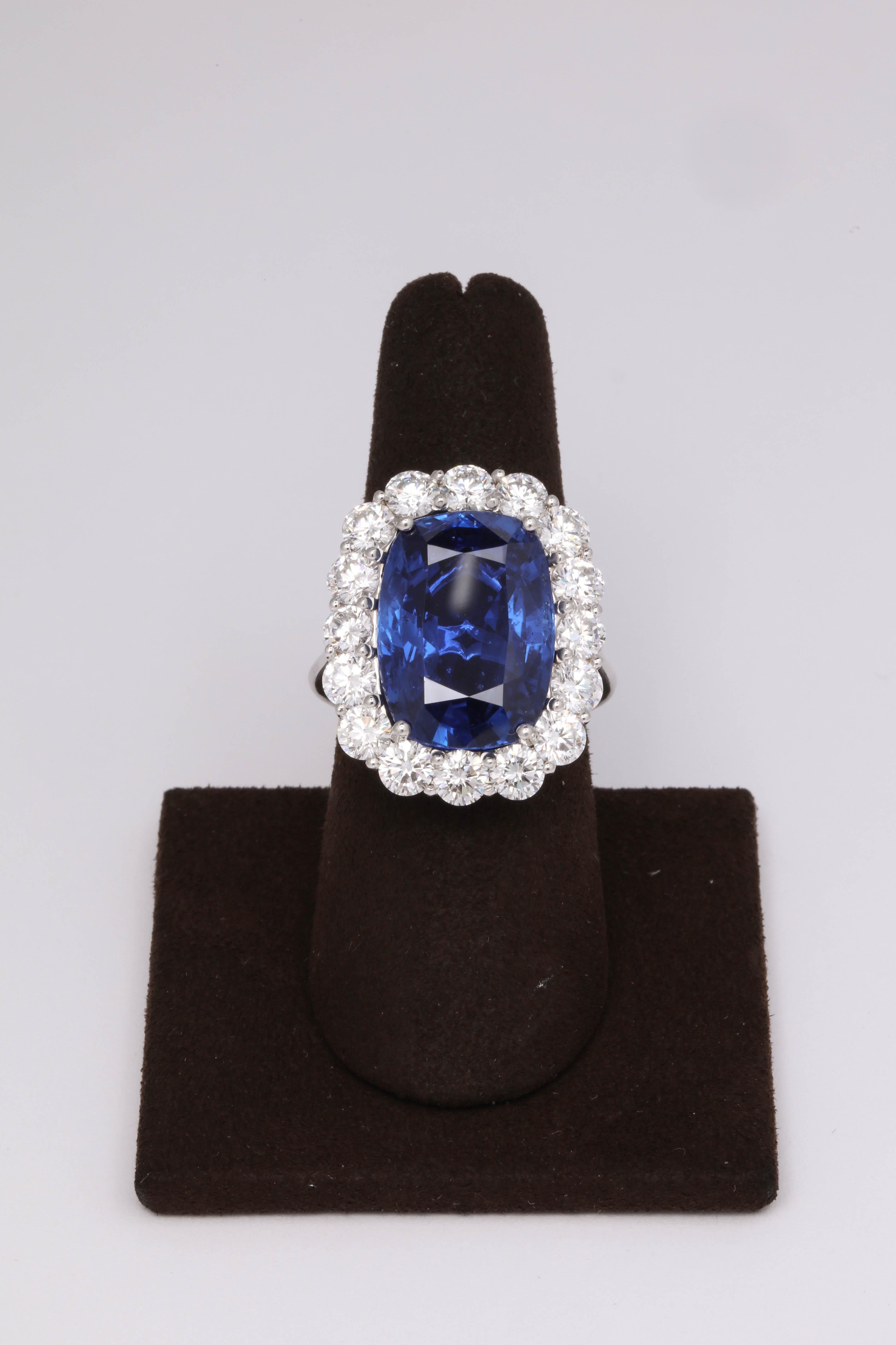 
An INCREDIBLE ring!    A RARE find!

Certified 19.19 carat Ceylon Natural No Heat Blue Sapphire with exquisite color and brilliance. 

4 carats of round brilliant cut diamonds 

Set in platinum 

The ring is currently a size 6.5 but can easily be