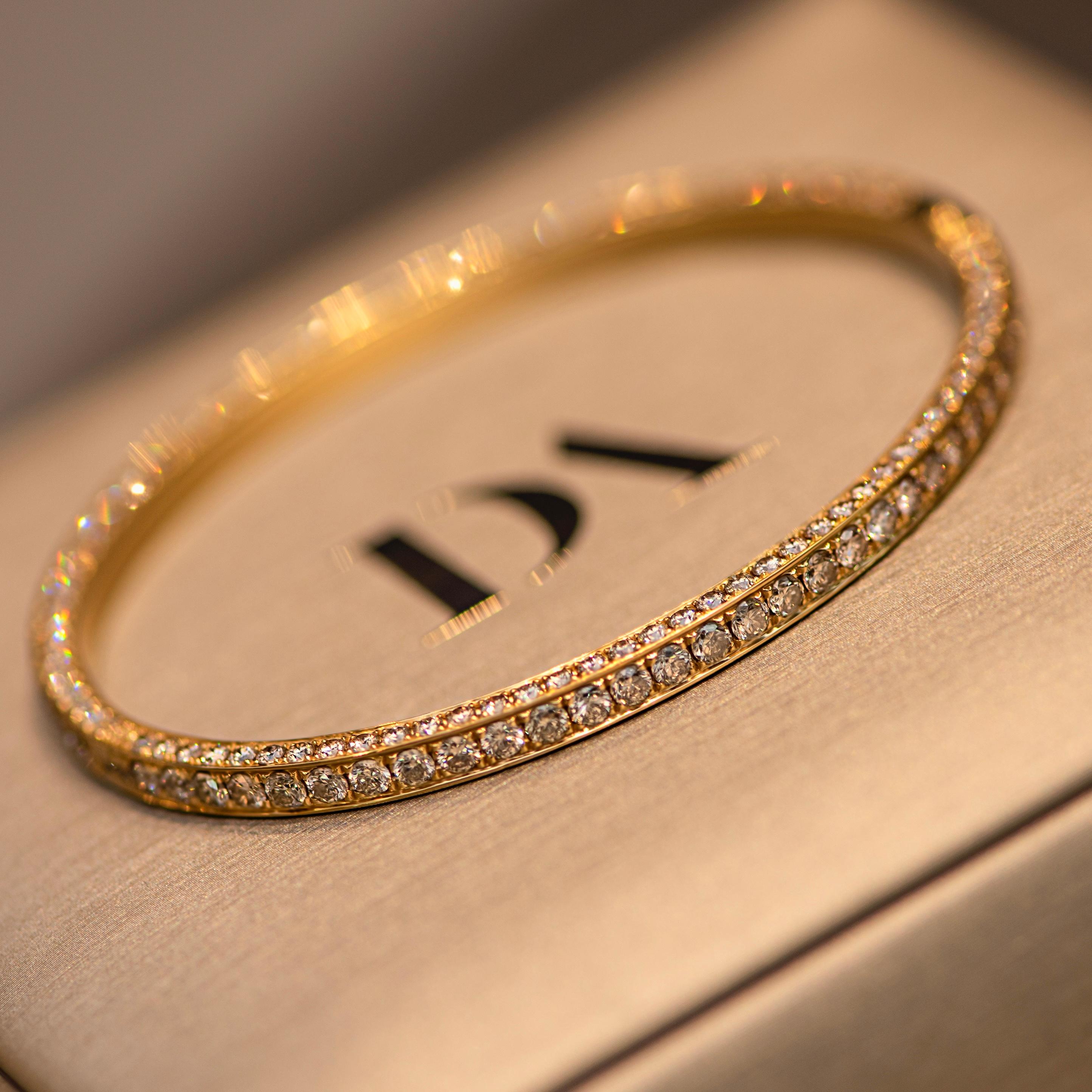 Do you like bracelets? If yes, we have one very nice and airy option for you
Delicate elegant and unusual bangle with champagne diamonds look very elegant and airy on the hand and attracts the attention with it amazing sparkle
This bracelet is on