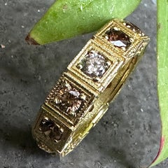 1.9 Carat Eternity Ring in 14 Karat Yellow Gold with 12 Brown & White Diamonds