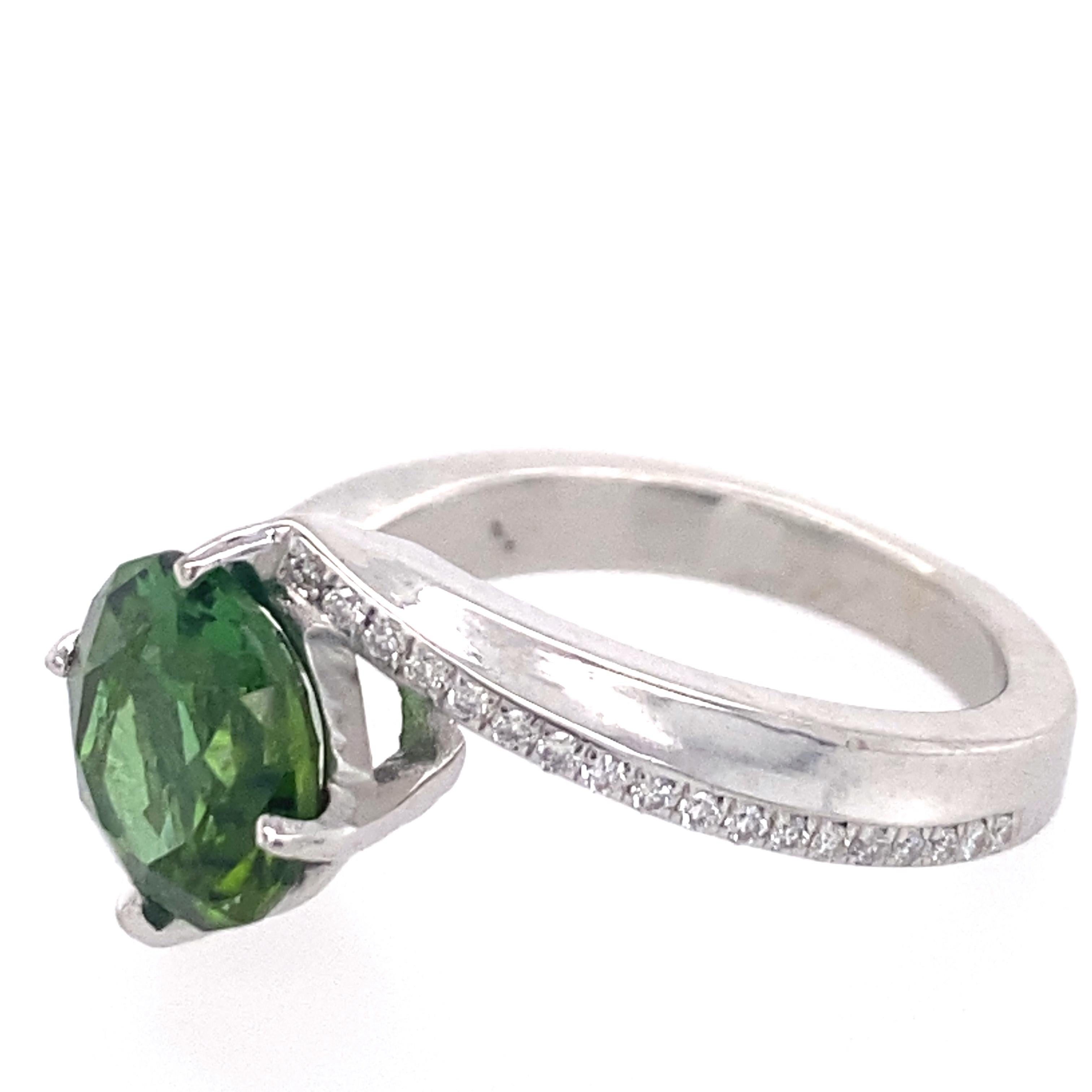 Women's or Men's 1.9 Carat Green Tourmaline Bypass Ring in Platinum Accented with Tiny Diamonds For Sale