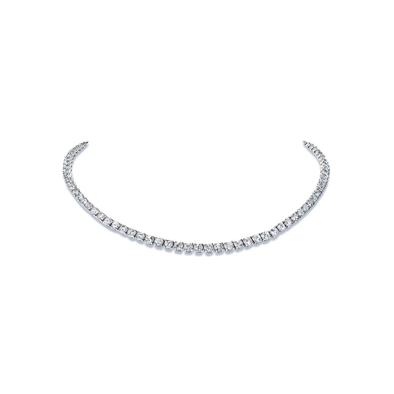 Earth Mined Diamond:
Carat Weight: 18.68 Carats
Style: Round Brilliant Cut
Chains: 14 Karat White Gold 26.60 grams