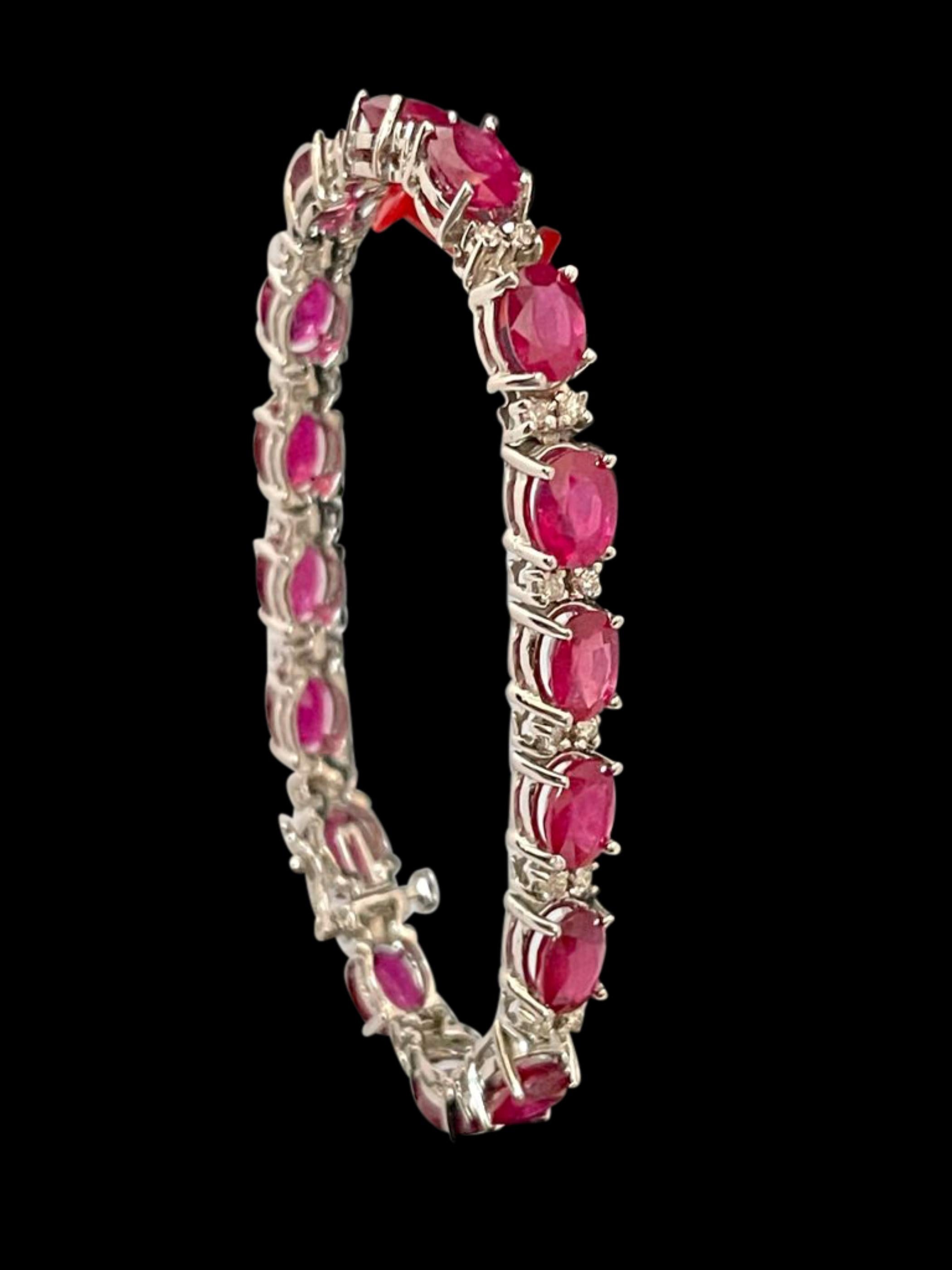 This exceptionally affordable Tennis bracelet has 19 stones of oval Treated Rubies . 
Ruby is Treated. The weight of the Ruby is 19 Carat , Each ruby is approximately 1 ct , measuring 5X7 MM
Each Ruby is spaced by two diamonds .Total number of