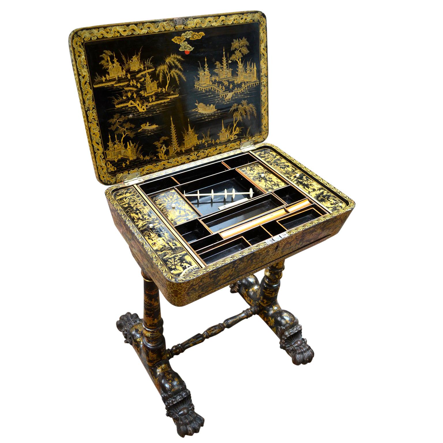 Chinese antique sewing table, black lacquer with beautiful and ornate gold lacquer designs depicting scenes of palace life, the case showing a composition of figures in an elaborate pavilion garden. This is unusual in that the whole area is covered
