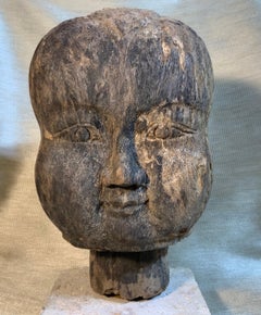 19th Century Hand Carved Wood Baby Monk Face